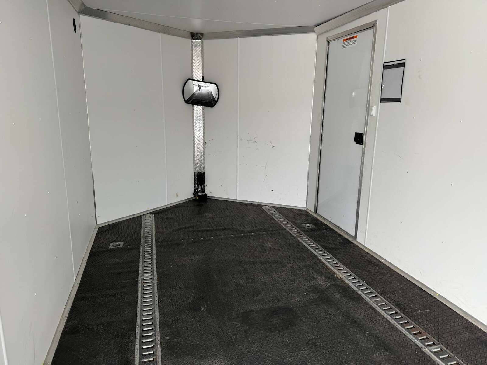 Photo of Pre Owned Used 2022 Alcom Stealth 8.5x24 V Nose Enclosed Cargo Car Hauler Trailer w/ Ramp Door & Elite Side Escape Door & Extended Rear Loading Ramps
