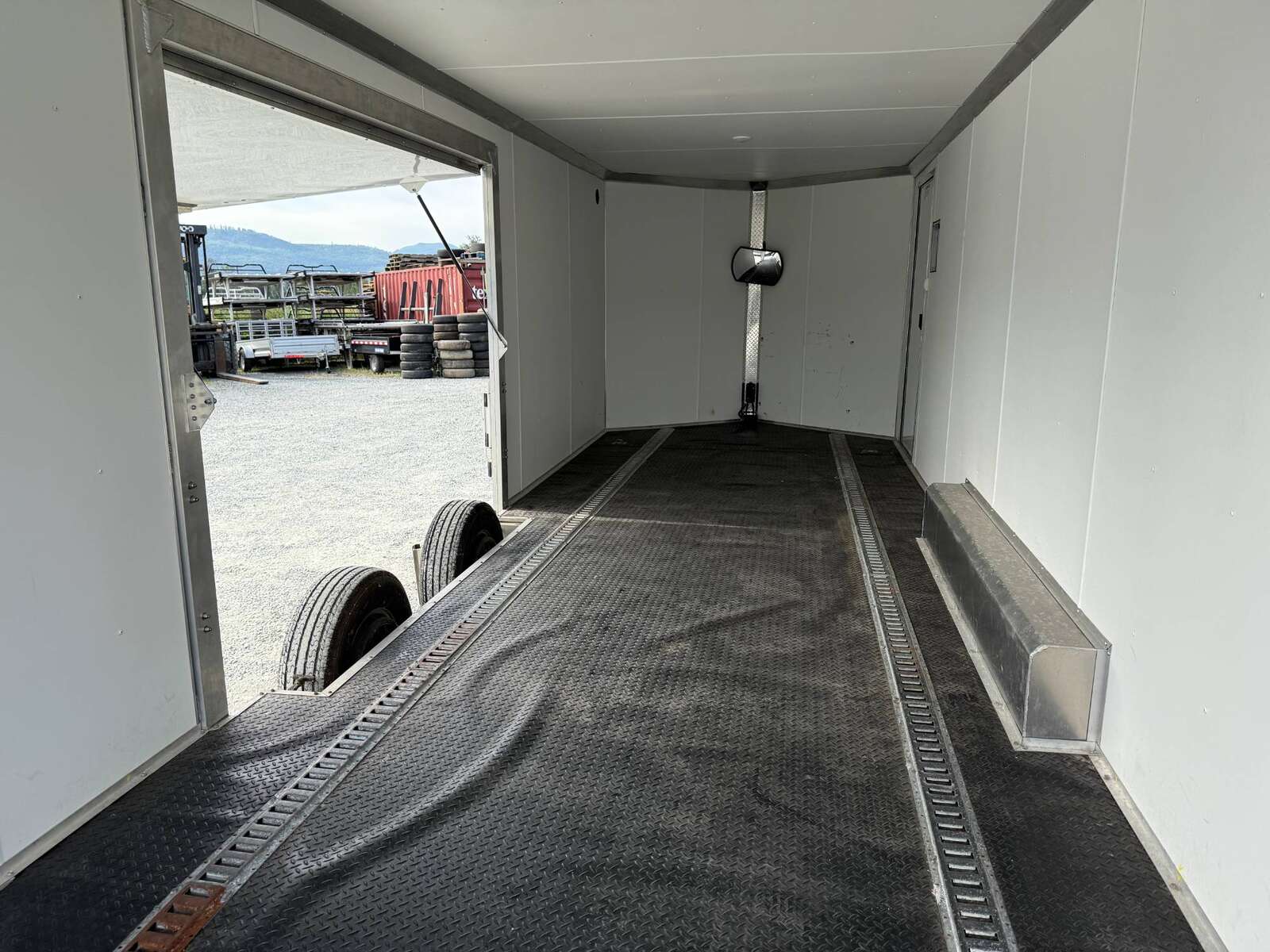 Photo of Pre Owned Used 2022 Alcom Stealth 8.5x24 V Nose Enclosed Cargo Car Hauler Trailer w/ Ramp Door & Elite Side Escape Door & Extended Rear Loading Ramps