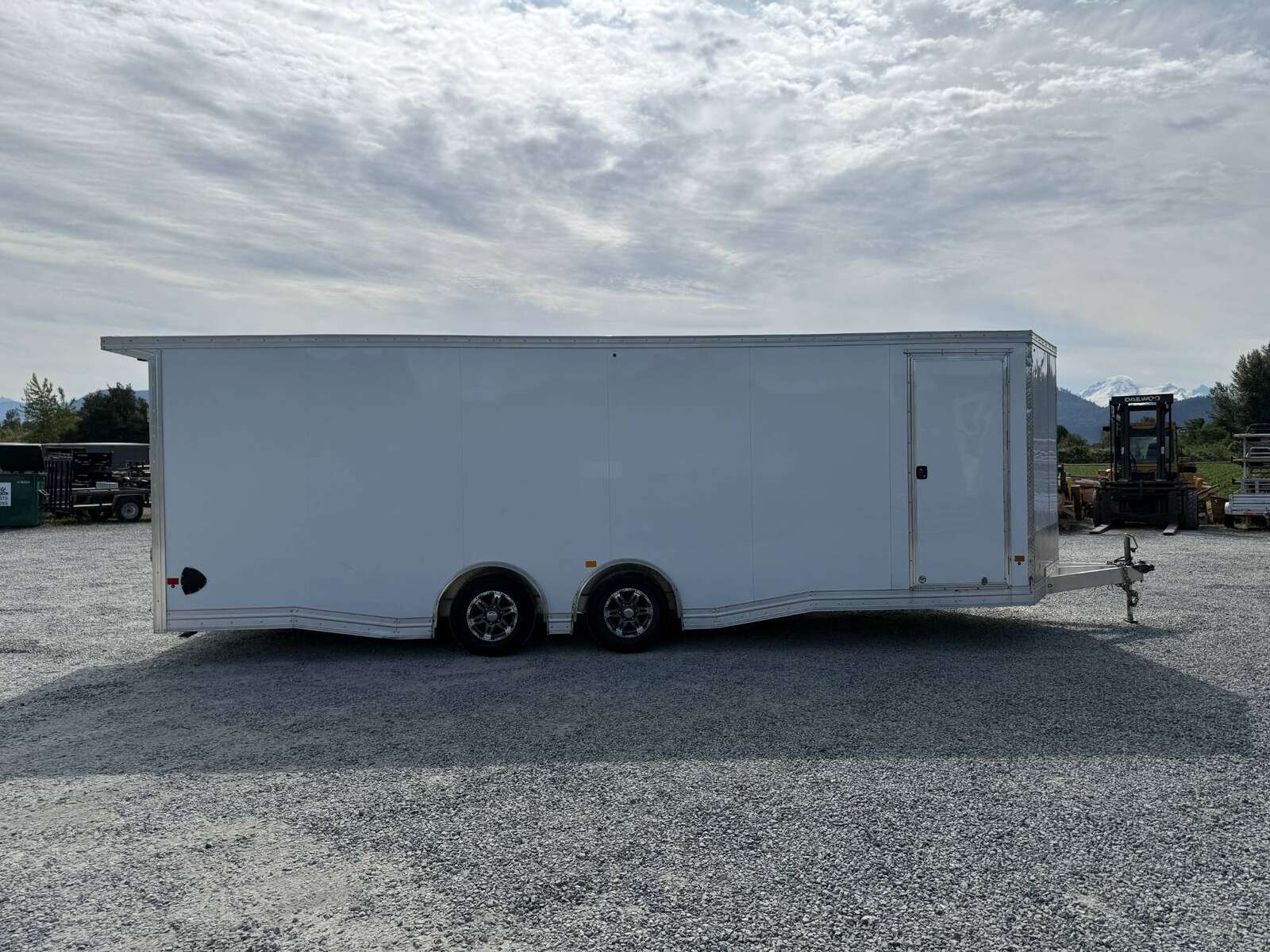Photo of Pre Owned Used 2022 Alcom Stealth 8.5x24 V Nose Enclosed Cargo Car Hauler Trailer w/ Ramp Door & Elite Side Escape Door & Extended Rear Loading Ramps
