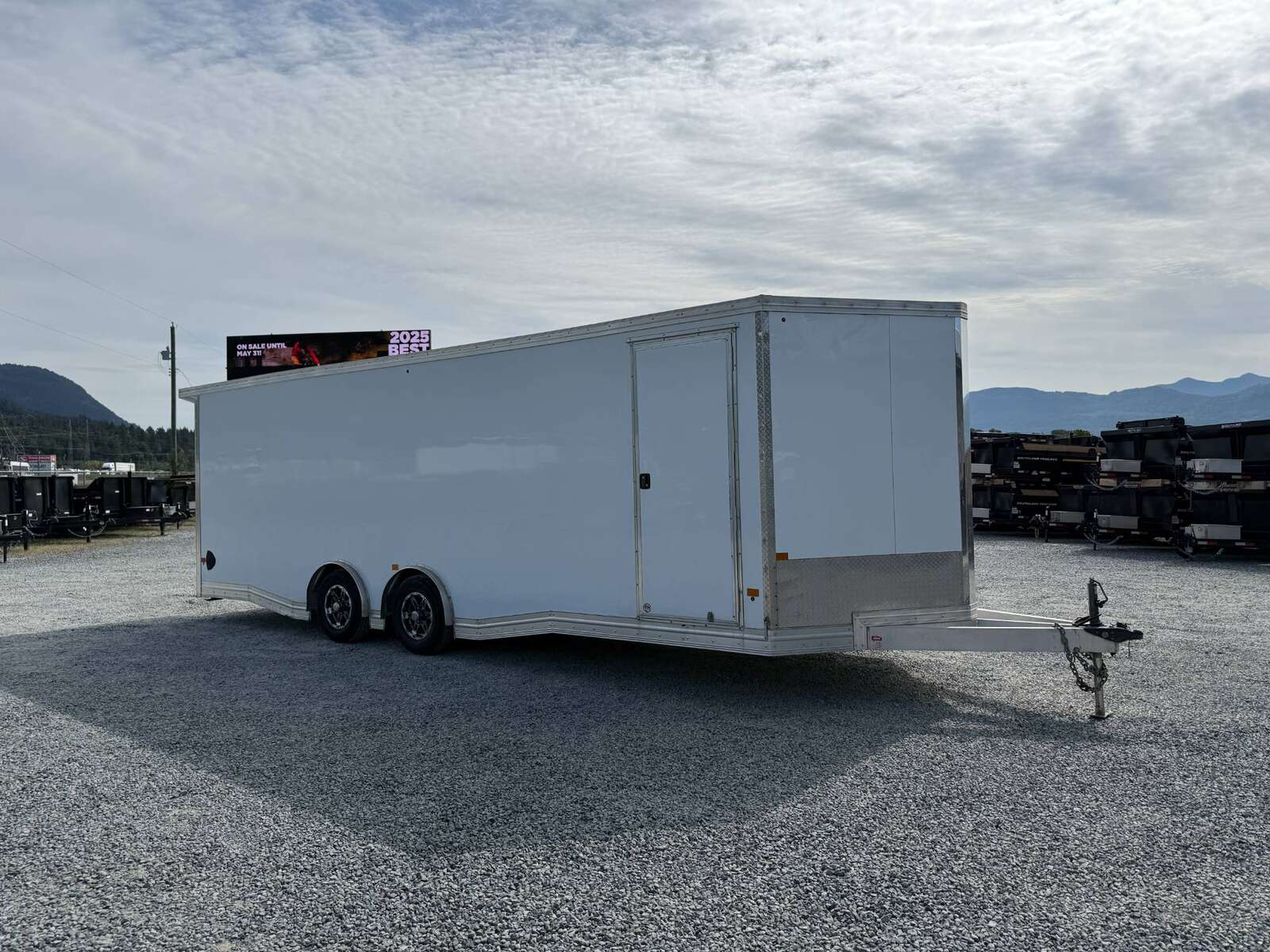 Photo of Pre Owned Used 2022 Alcom Stealth 8.5x24 V Nose Enclosed Cargo Car Hauler Trailer w/ Ramp Door & Elite Side Escape Door & Extended Rear Loading Ramps