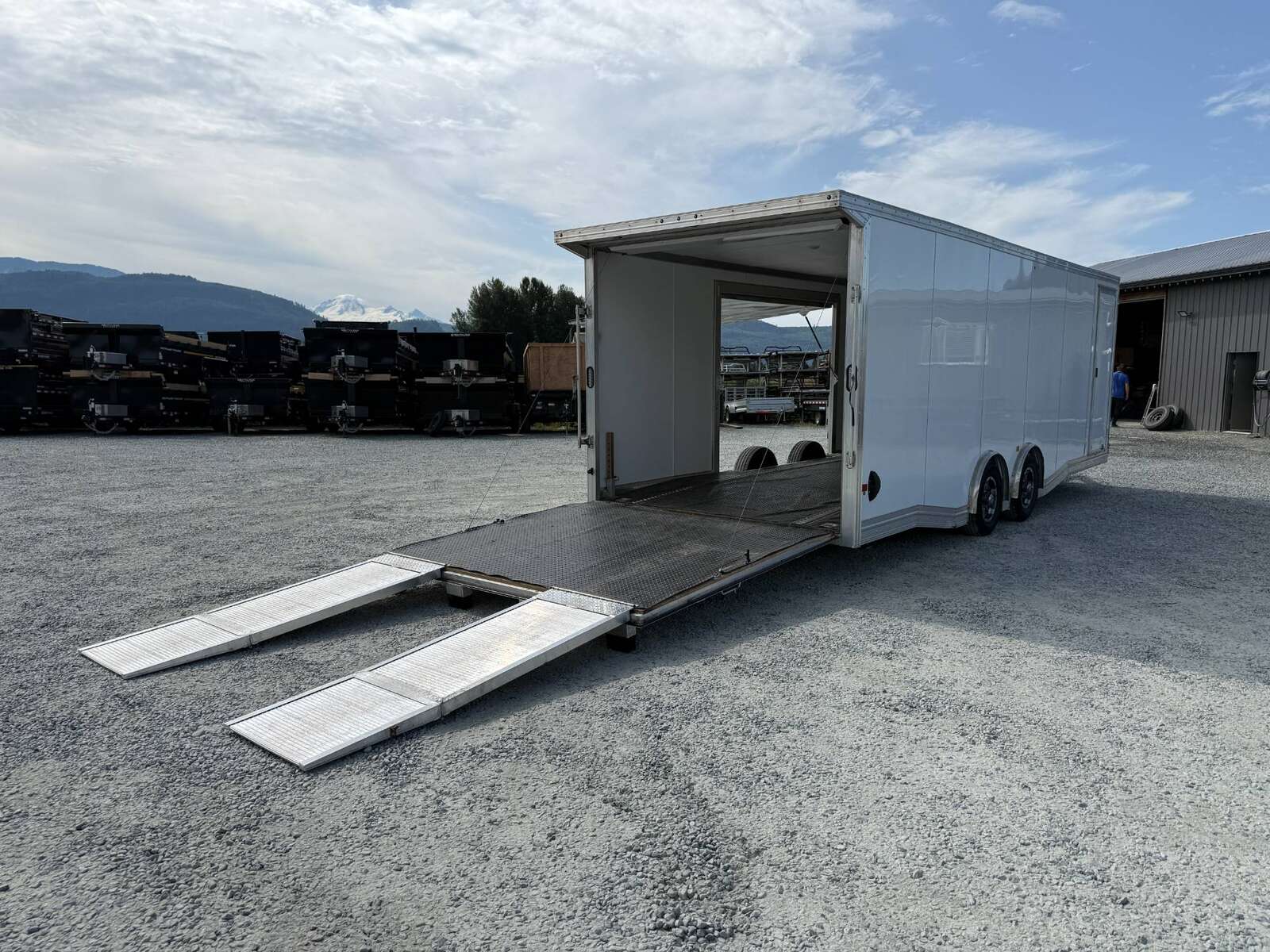Photo of Pre Owned Used 2022 Alcom Stealth 8.5x24 V Nose Enclosed Cargo Car Hauler Trailer w/ Ramp Door & Elite Side Escape Door & Extended Rear Loading Ramps