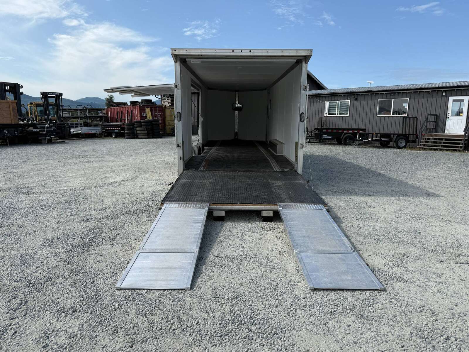 Photo of Pre Owned Used 2022 Alcom Stealth 8.5x24 V Nose Enclosed Cargo Car Hauler Trailer w/ Ramp Door & Elite Side Escape Door & Extended Rear Loading Ramps