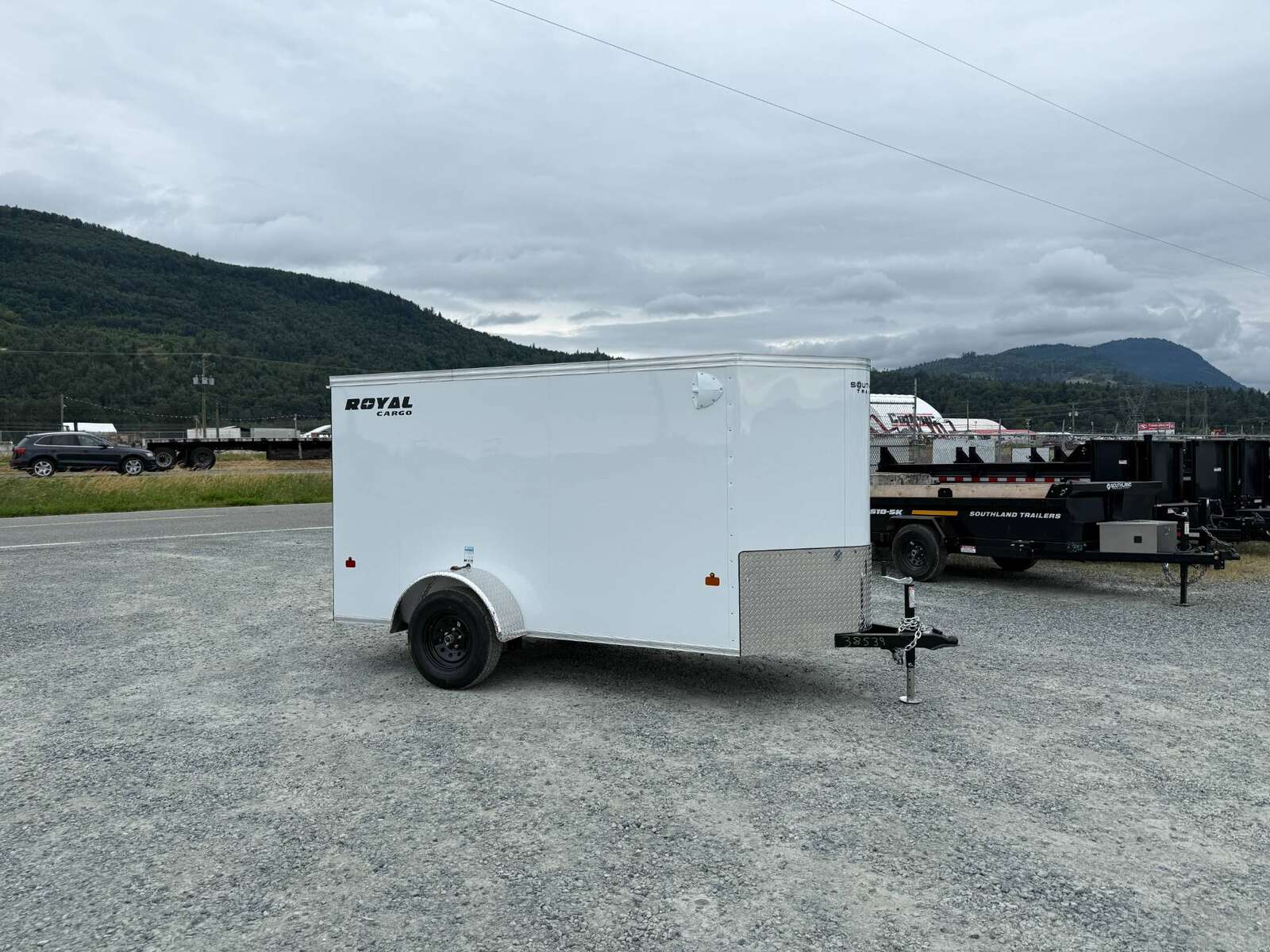 Photo of 2026 Royal Cargo 5x10 Cargo Enclosed Trailer V Nose Ramp Door Charcoal White
