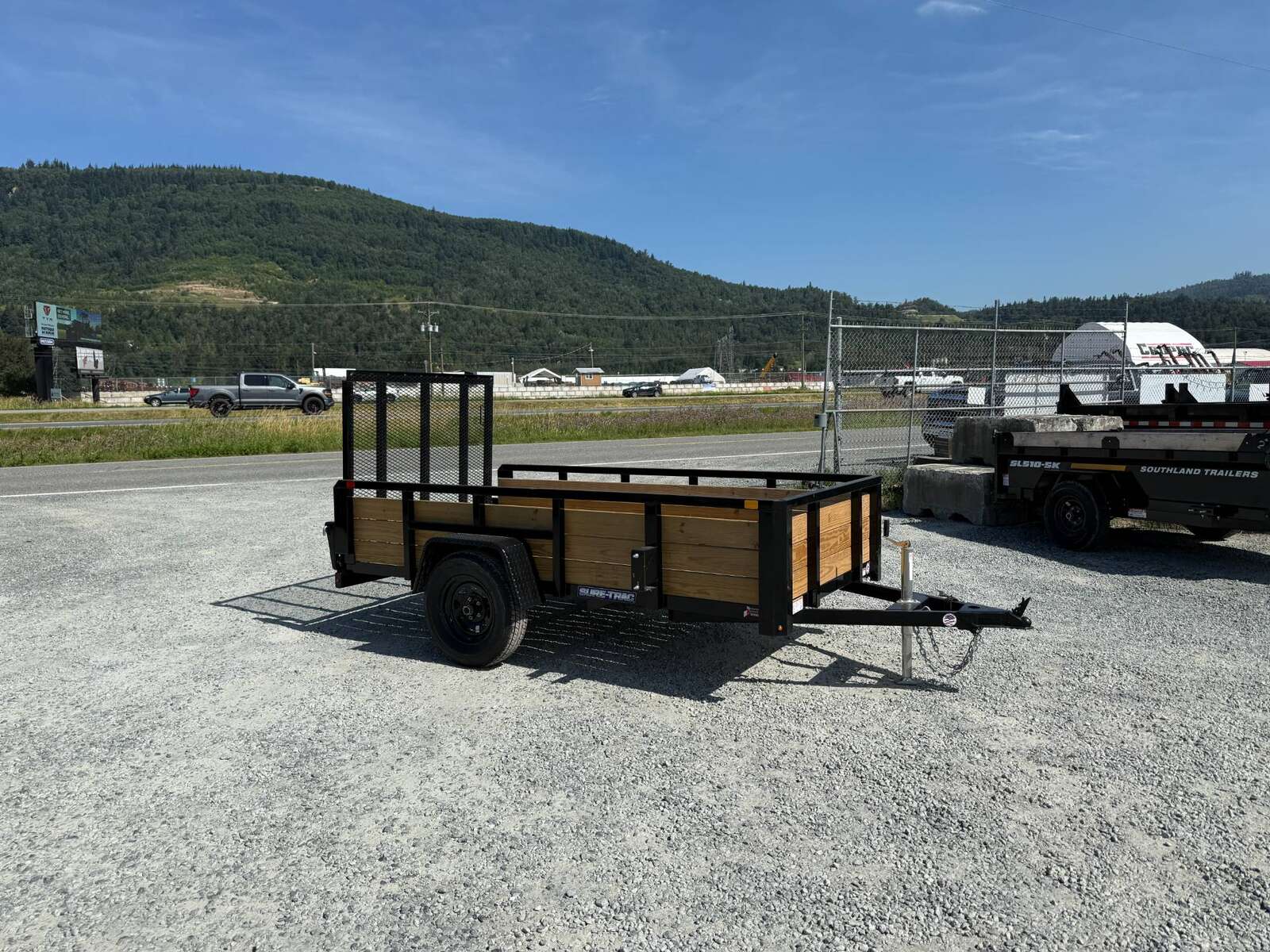 Photo of 2025 Suretrac 5x10 Landscape Utility Trailer 3 Board High Side w/ Ramp Gate 2990lb GVW