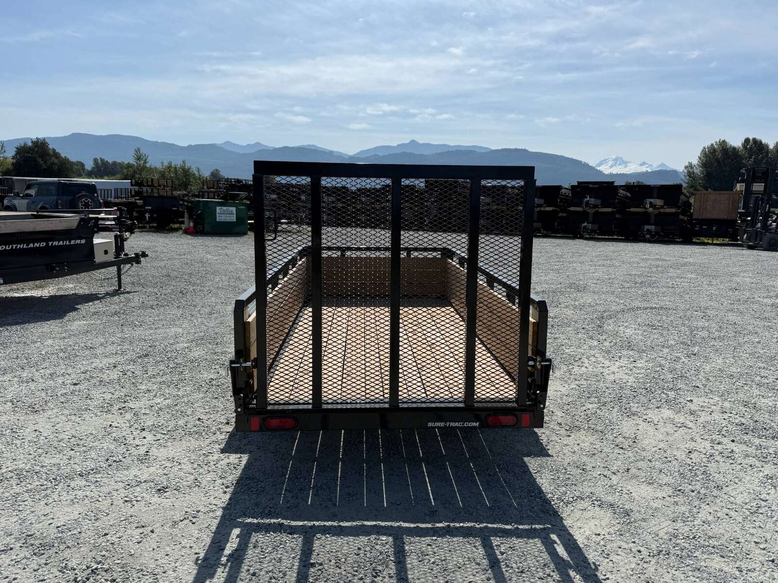 Photo of 2025 Suretrac 5x10 Landscape Utility Trailer 3 Board High Side w/ Ramp Gate 2990lb GVW