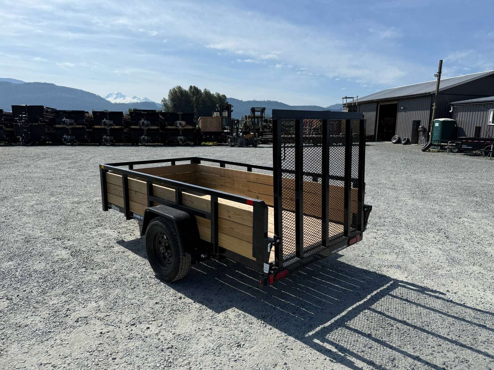 Photo of 2025 Suretrac 5x10 Landscape Utility Trailer 3 Board High Side w/ Ramp Gate 2990lb GVW