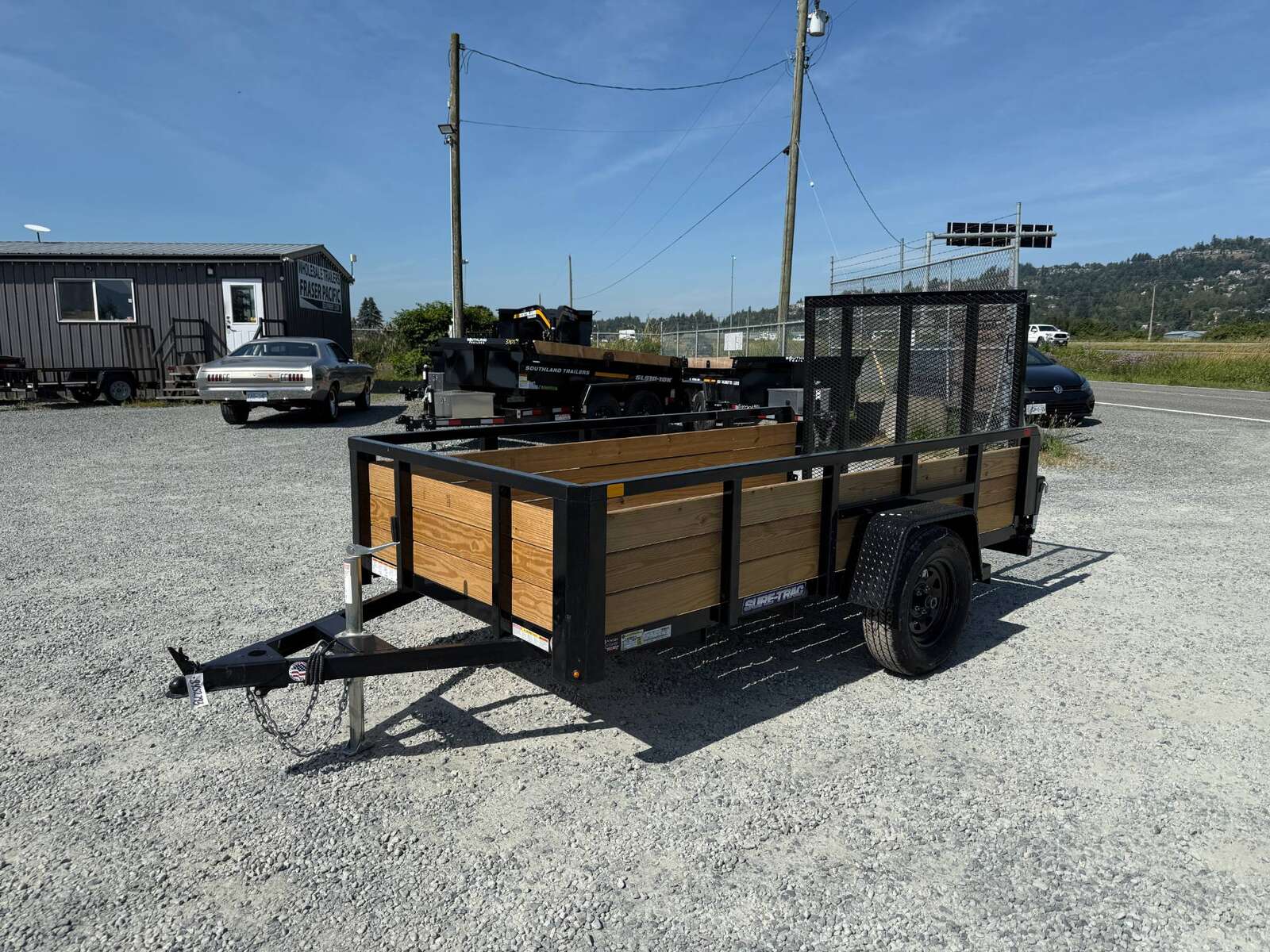 Photo of 2025 Suretrac 5x10 Landscape Utility Trailer 3 Board High Side w/ Ramp Gate 2990lb GVW