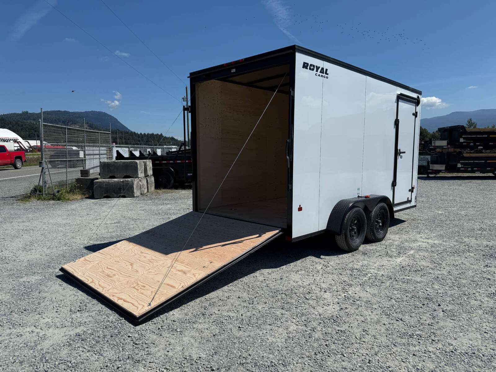 Photo of 2026 Royal 7x14 V Nose Cargo / Enclosed Trailer Extra Height Ramp Door White w/ Blackout Trim Package 7700lb GVW