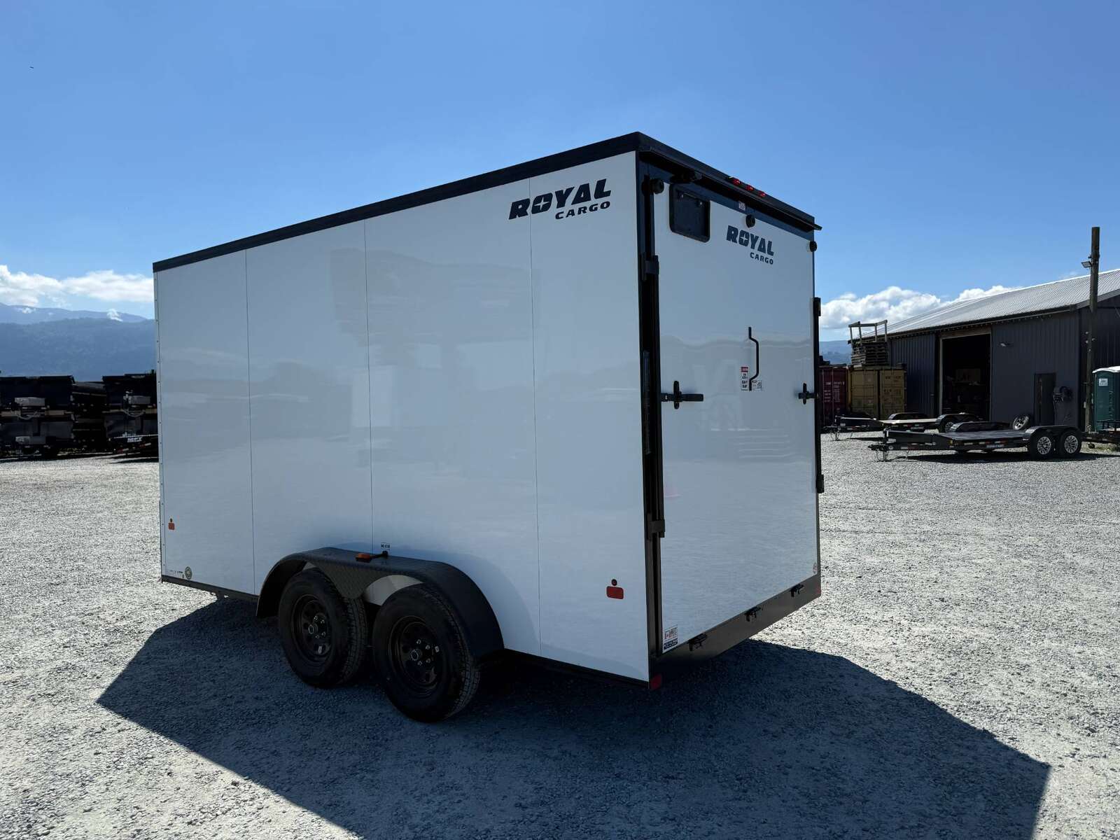 Photo of 2026 Royal 7x14 V Nose Cargo / Enclosed Trailer Extra Height Ramp Door White w/ Blackout Trim Package 7700lb GVW