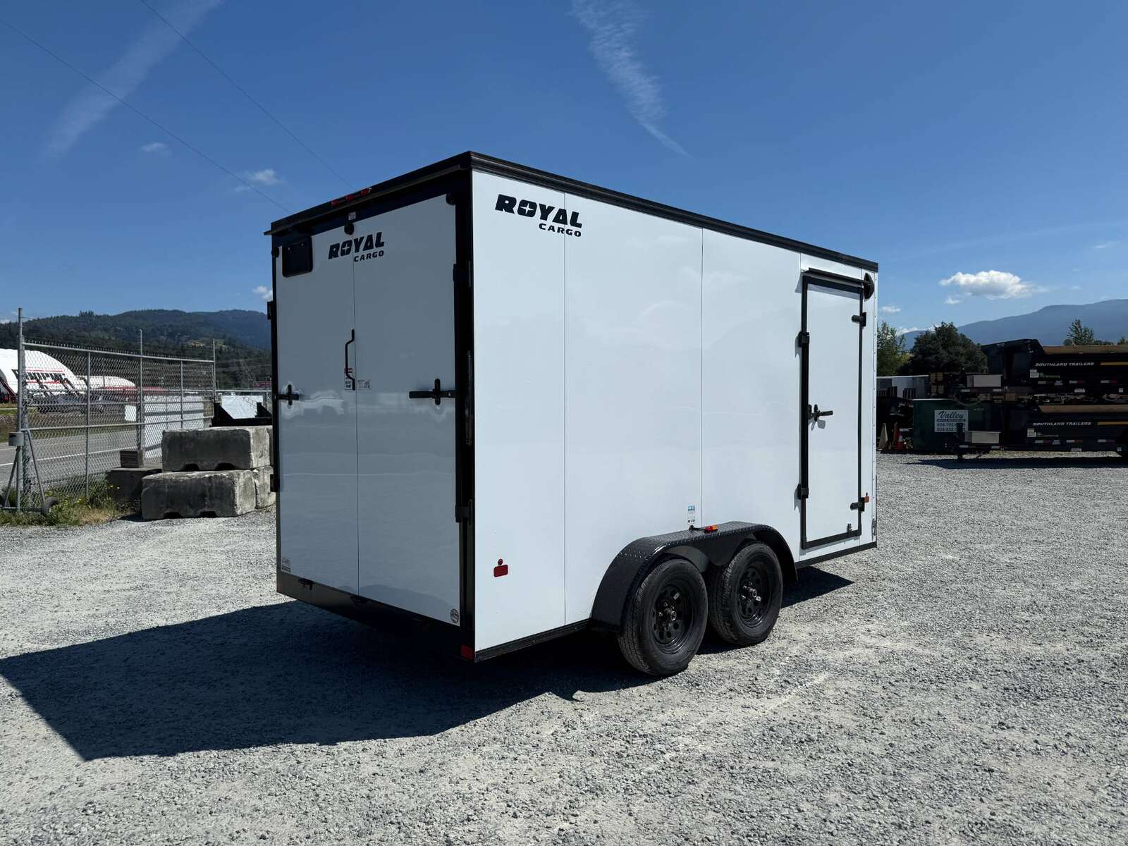Photo of 2026 Royal 7x14 V Nose Cargo / Enclosed Trailer Extra Height Ramp Door White w/ Blackout Trim Package 7700lb GVW