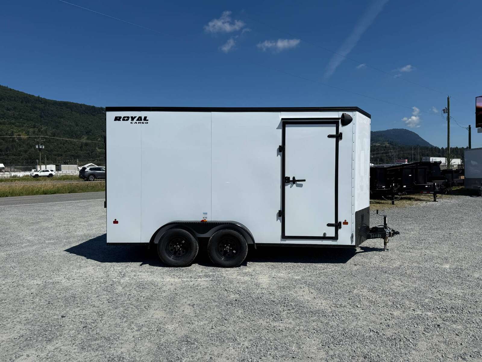 Photo of 2026 Royal 7x14 V Nose Cargo / Enclosed Trailer Extra Height Ramp Door White w/ Blackout Trim Package 7700lb GVW