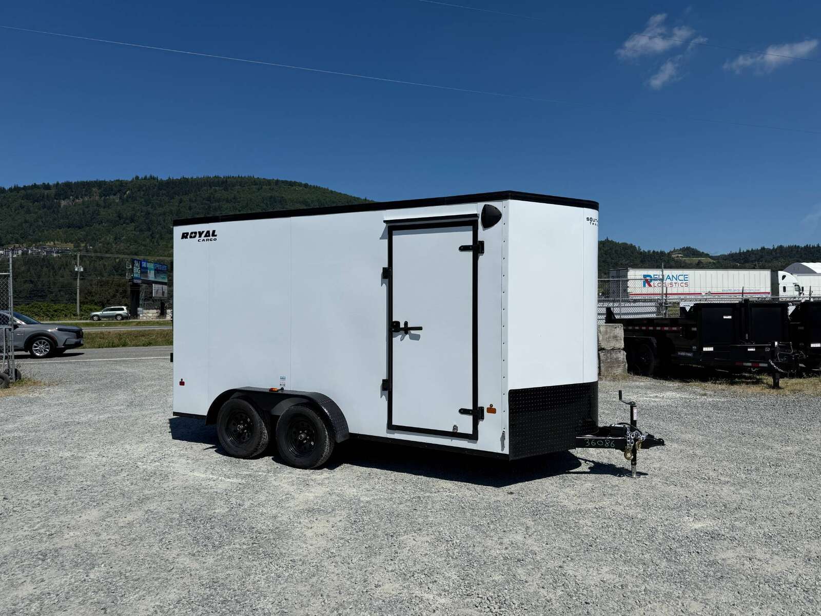 Photo of 2026 Royal 7x14 V Nose Cargo / Enclosed Trailer Extra Height Ramp Door White w/ Blackout Trim Package 7700lb GVW