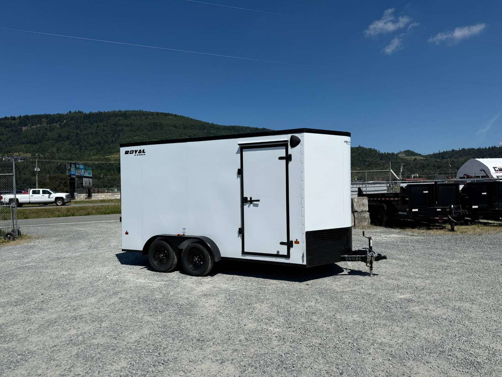 Photo of 2026 Royal 7x14 V Nose Cargo / Enclosed Trailer Extra Height Ramp Door White w/ Blackout Trim Package 7700lb GVW
