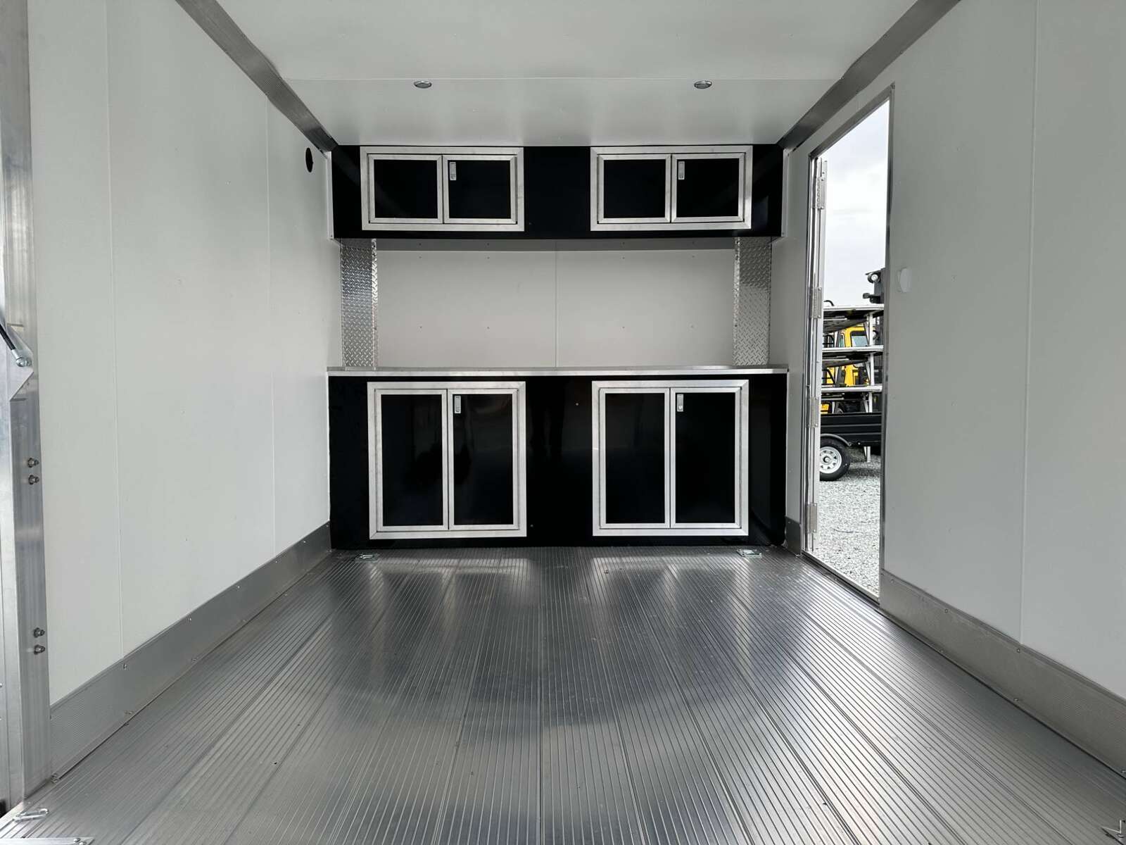 Photo of 2026 ALCOM ALUMINUM 8.5x24 CAR TRAILER 9900lb GVW WHITE LARGE ESCAPE SIDE DOOR CARGO ENCLOSED