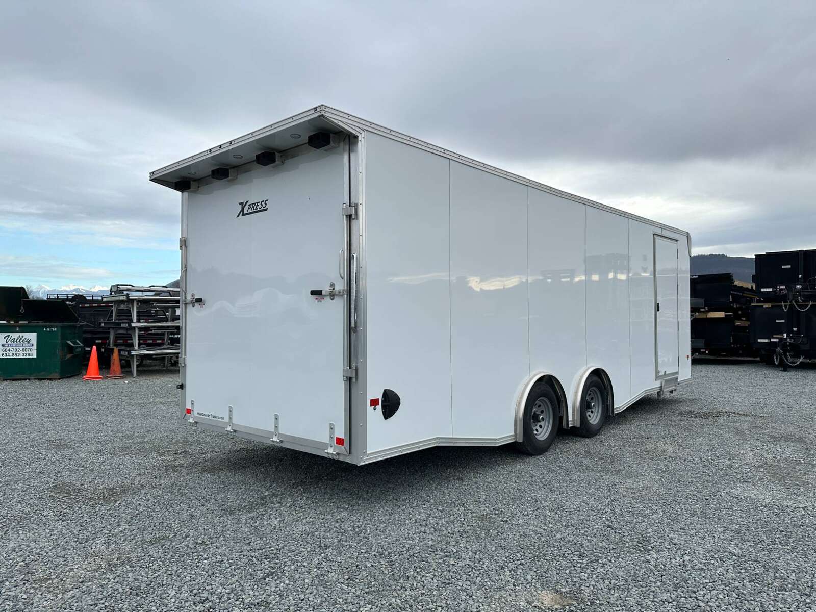 Photo of 2026 ALCOM ALUMINUM 8.5x24 CAR TRAILER 9900lb GVW WHITE LARGE ESCAPE SIDE DOOR CARGO ENCLOSED