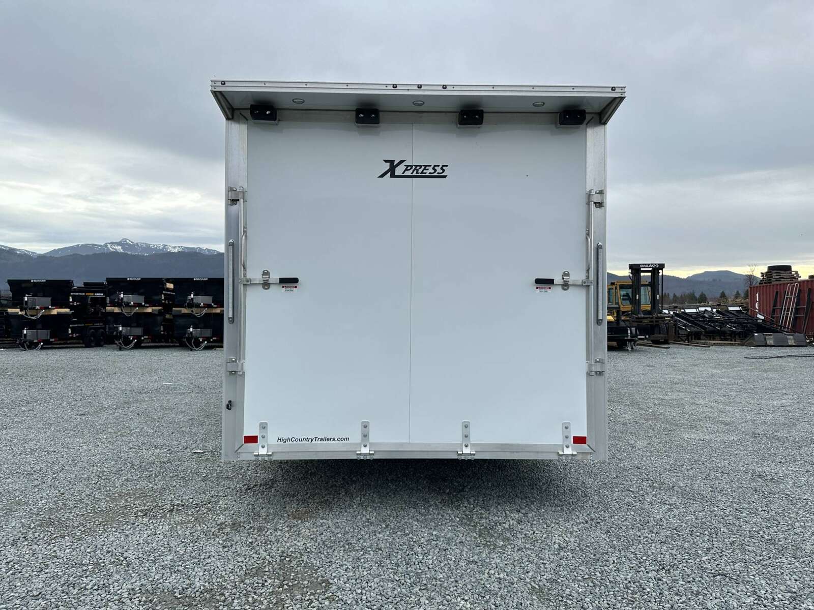 Photo of 2026 ALCOM ALUMINUM 8.5x24 CAR TRAILER 9900lb GVW WHITE LARGE ESCAPE SIDE DOOR CARGO ENCLOSED