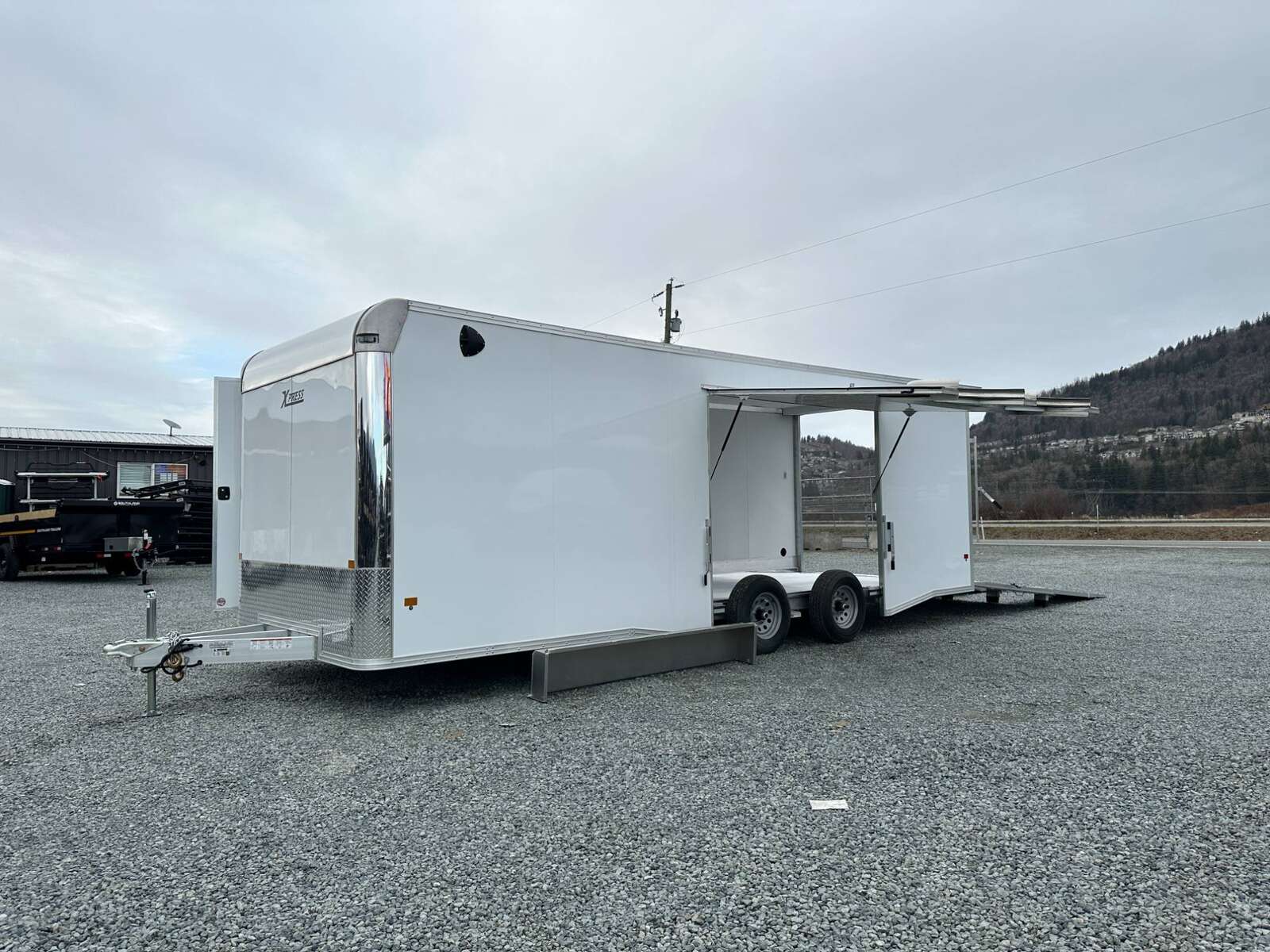 Photo of 2026 ALCOM ALUMINUM 8.5x24 CAR TRAILER 9900lb GVW WHITE LARGE ESCAPE SIDE DOOR CARGO ENCLOSED