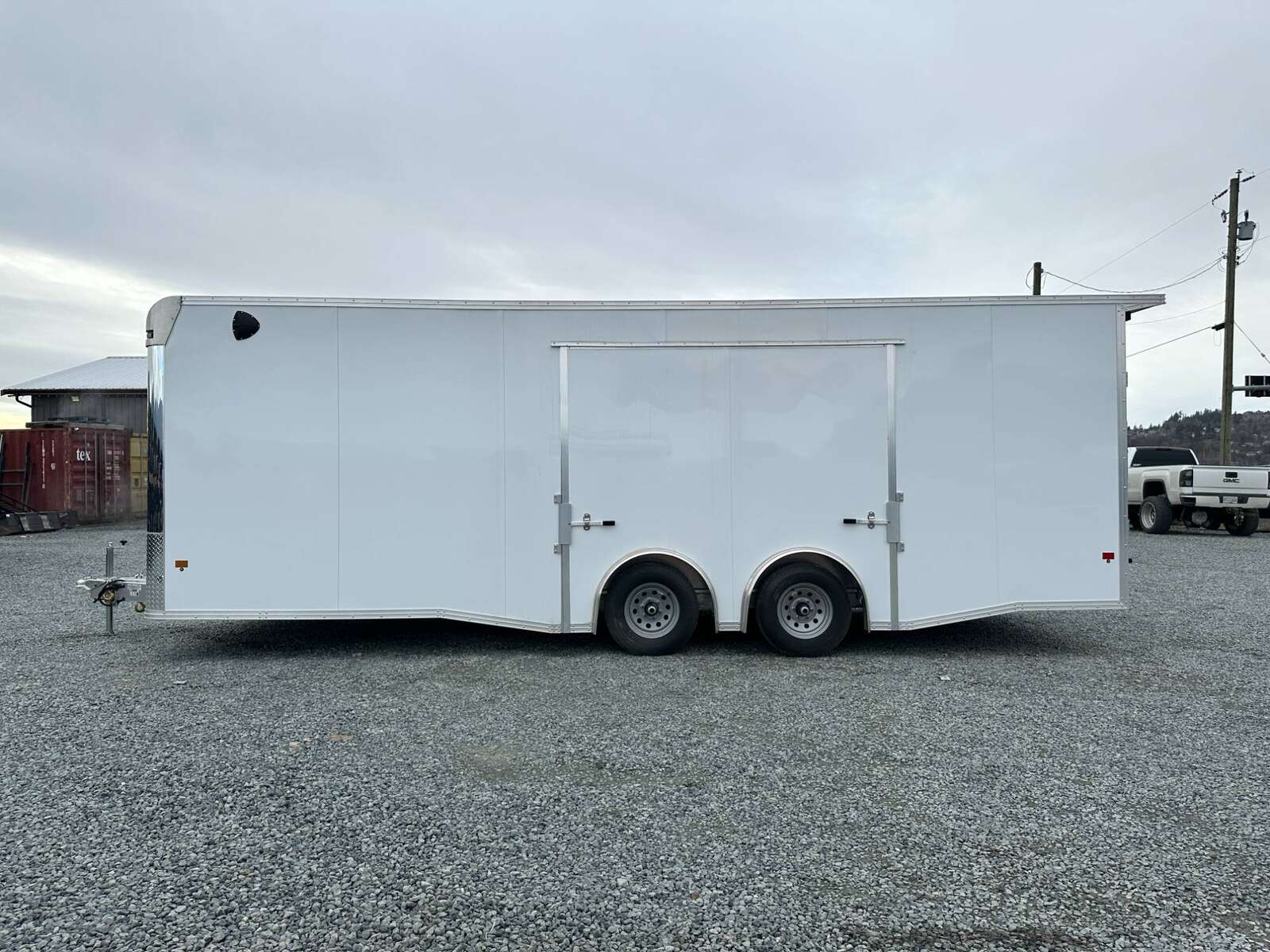 Photo of 2026 ALCOM ALUMINUM 8.5x24 CAR TRAILER 9900lb GVW WHITE LARGE ESCAPE SIDE DOOR CARGO ENCLOSED