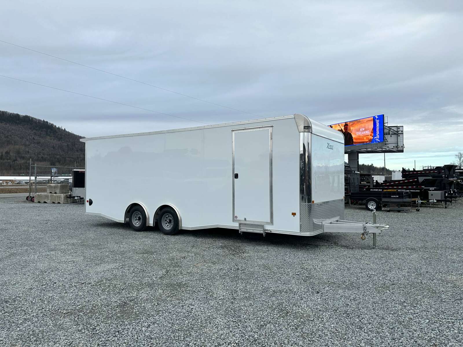 Photo of 2026 ALCOM ALUMINUM 8.5x24 CAR TRAILER 9900lb GVW WHITE LARGE ESCAPE SIDE DOOR CARGO ENCLOSED