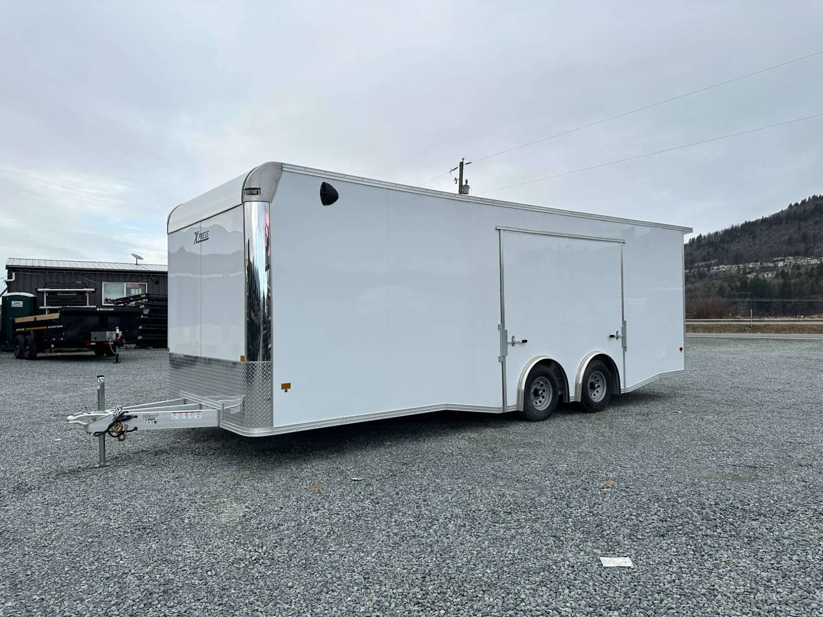 Photo of 2026 ALCOM ALUMINUM 8.5x24 CAR TRAILER 9900lb GVW WHITE LARGE ESCAPE SIDE DOOR CARGO ENCLOSED