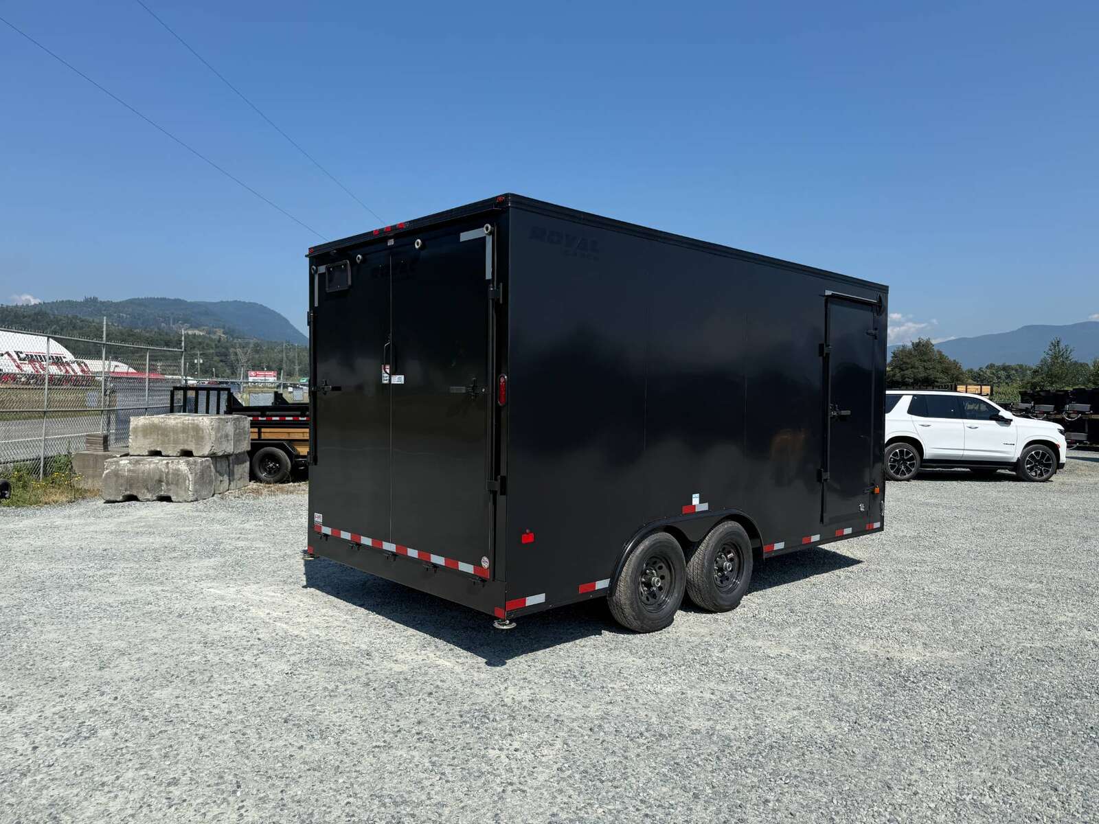 Photo of 2026 Royal Cargo 8.5X16 V NOSE Cargo / Enclosed Trailer BLACK OUT PACKAGE RAMP DOOR EXTRA HEIGHT 11,400LB GVW