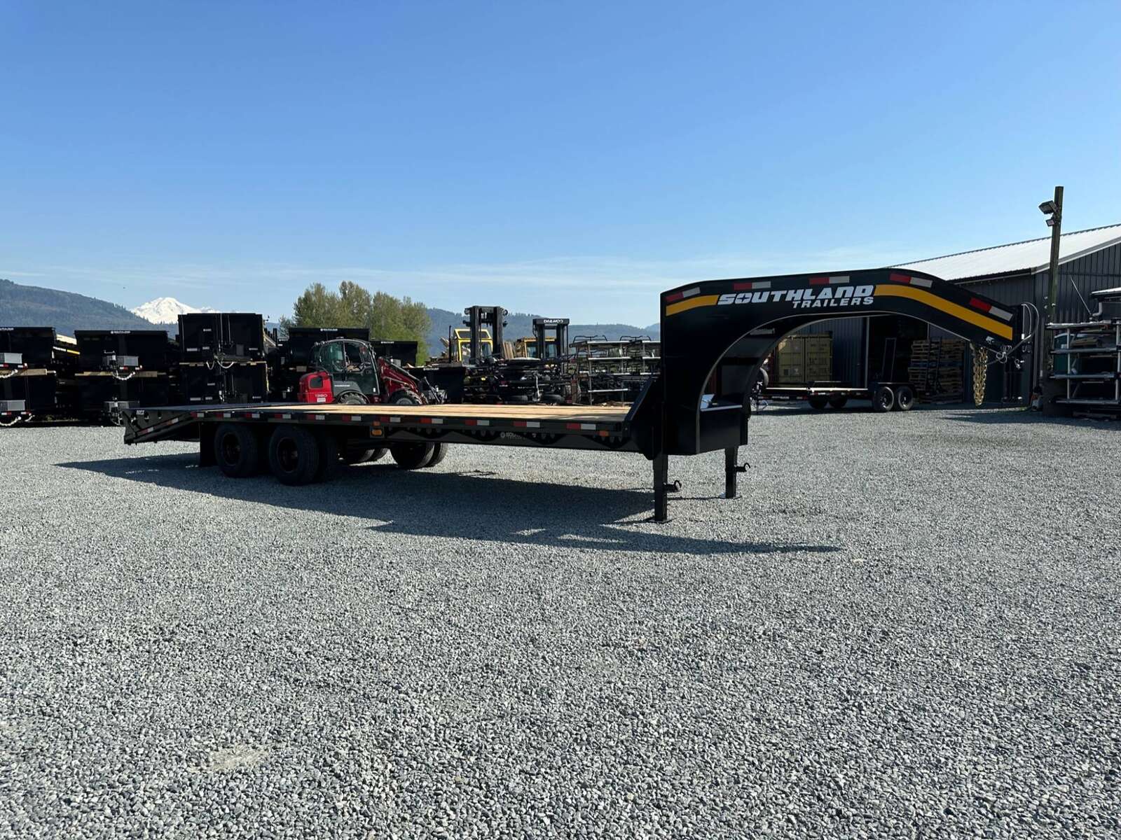 Photo of 2026 Southland 24+6 Gooseneck Equipment Flat Bed Trailer Deck Over 29,000lb GVW w/ Flip up ramps