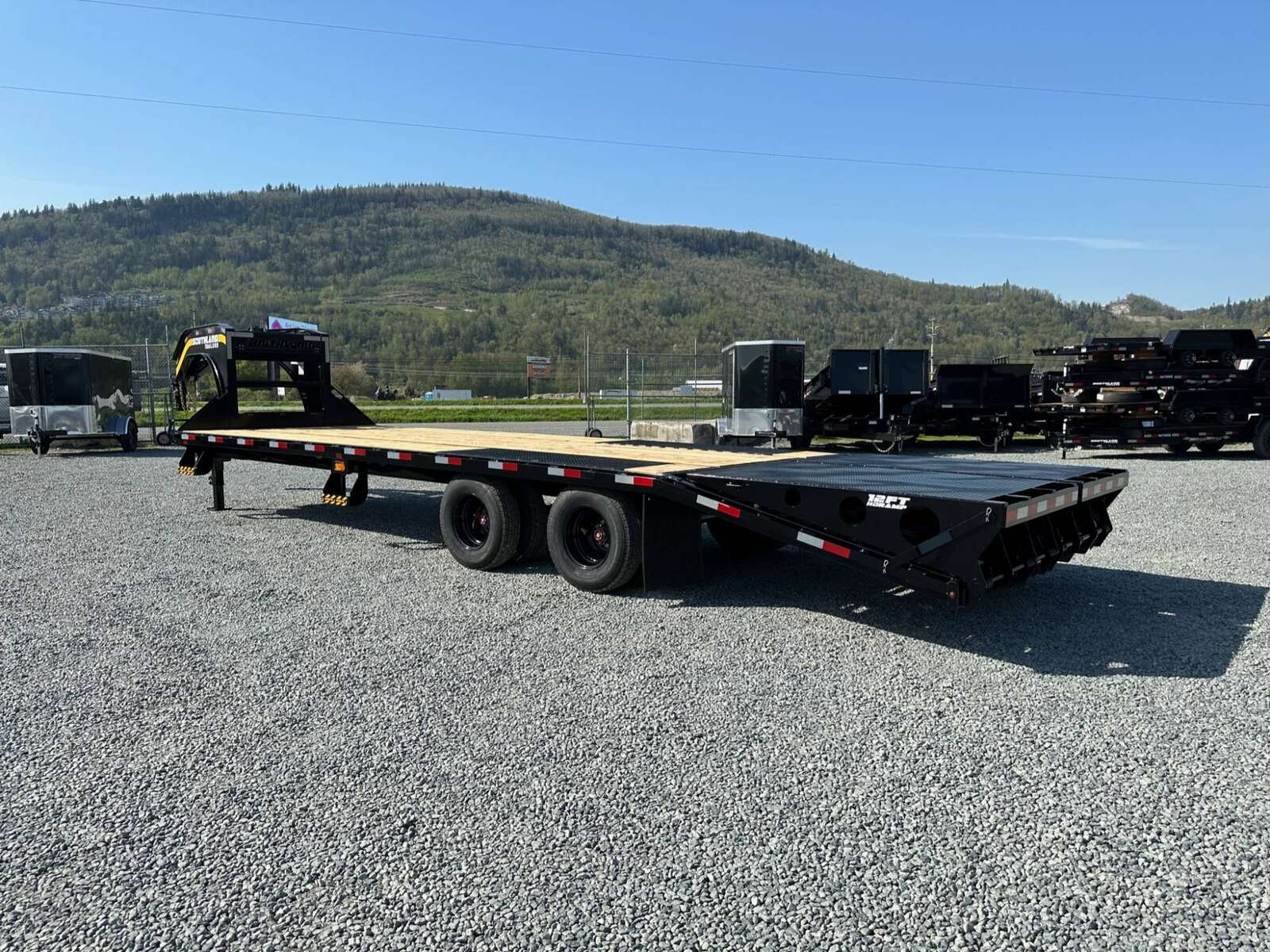 Photo of 2026 Southland 24+6 Gooseneck Equipment Flat Bed Trailer Deck Over 29,000lb GVW w/ Flip up ramps