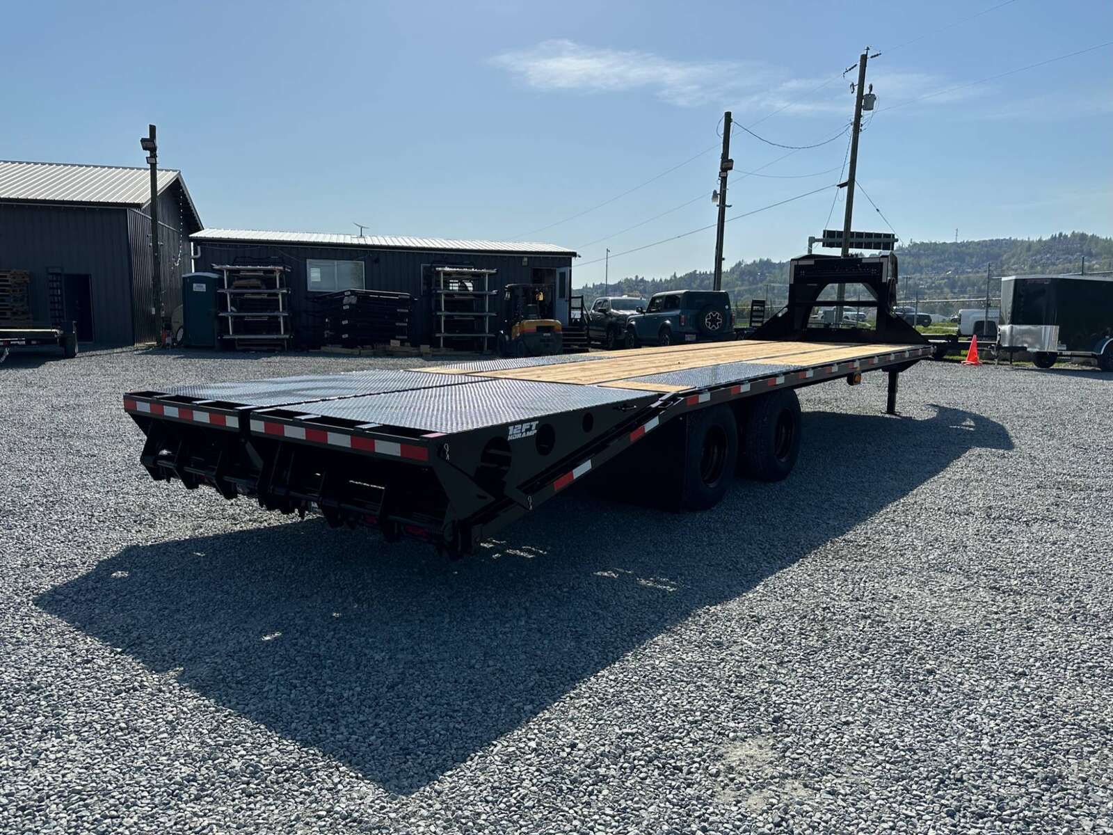 Photo of 2026 Southland 24+6 Gooseneck Equipment Flat Bed Trailer Deck Over 29,000lb GVW w/ Flip up ramps