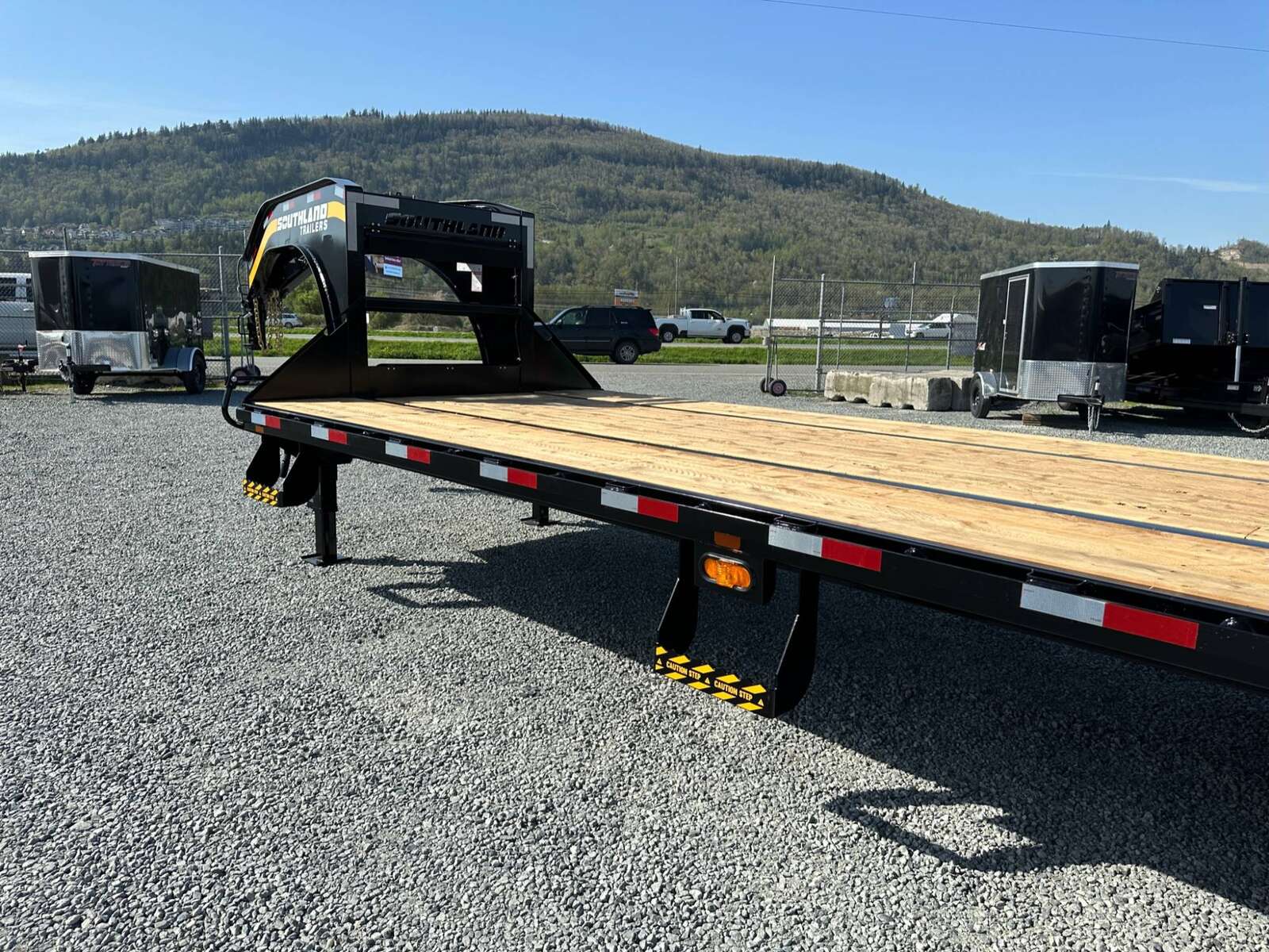 Photo of 2026 Southland 24+6 Gooseneck Equipment Flat Bed Trailer Deck Over 29,000lb GVW w/ Flip up ramps