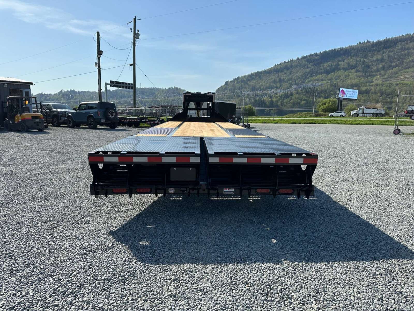 Photo of 2026 Southland 24+6 Gooseneck Equipment Flat Bed Trailer Deck Over 29,000lb GVW w/ Flip up ramps
