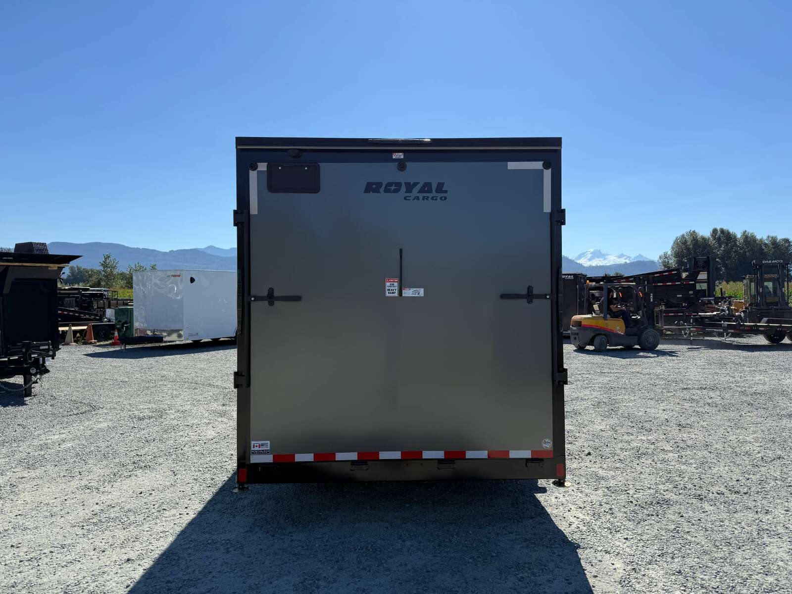 Photo of 2026 Royal 7.5x18 Cargo Enclosed Trailer Blackout Package w/ Side Windows Heavy Duty 11400lb GVW w/ Ramp Door Charcoal Grey