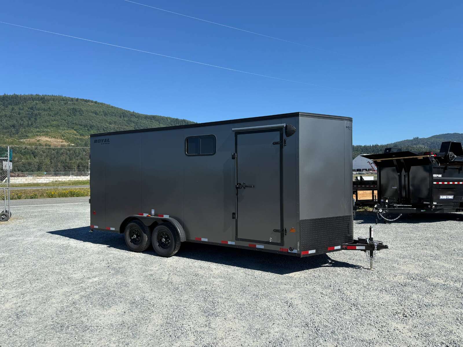 Photo of 2026 Royal 7.5x18 Cargo Enclosed Trailer Blackout Package w/ Side Windows Heavy Duty 11400lb GVW w/ Ramp Door Charcoal Grey