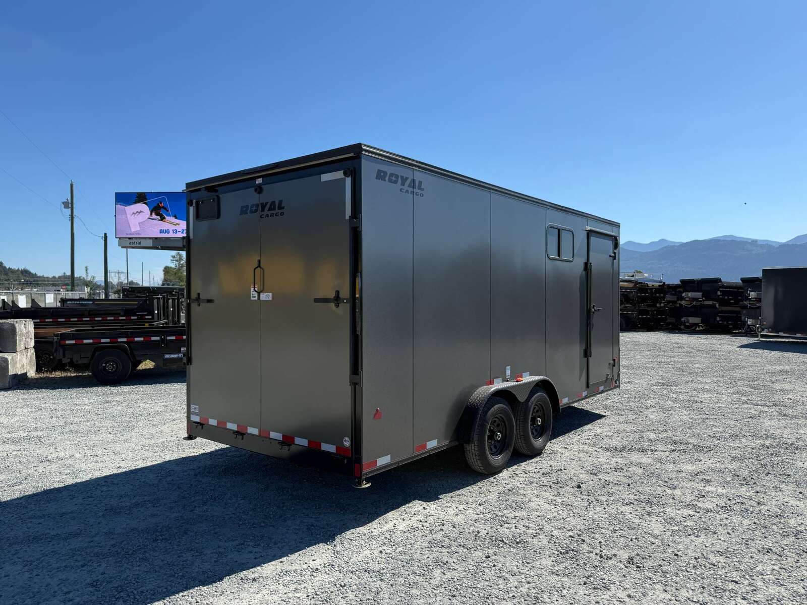 Photo of 2026 Royal 7.5x18 Cargo Enclosed Trailer Blackout Package w/ Side Windows Heavy Duty 11400lb GVW w/ Ramp Door Charcoal Grey
