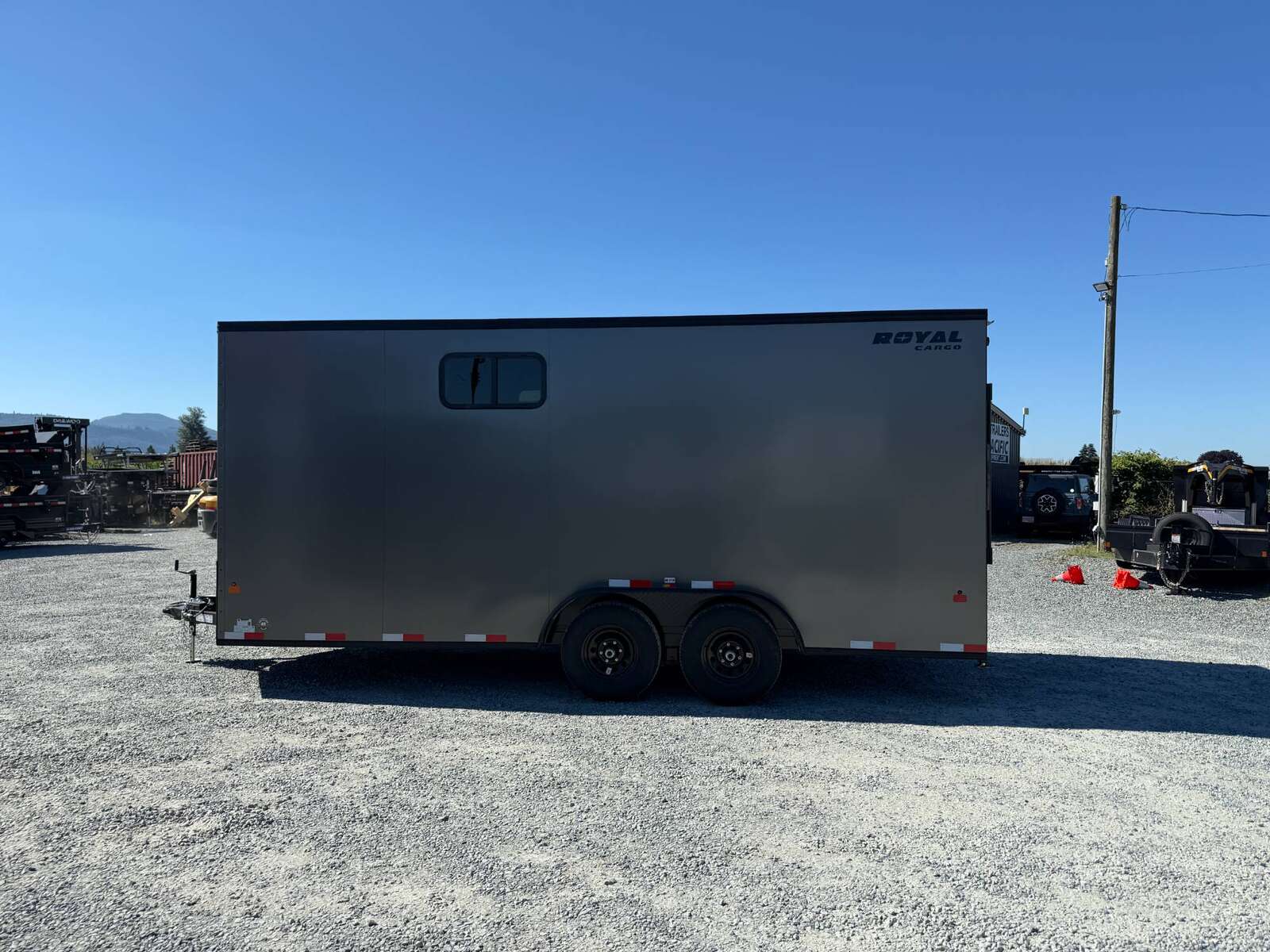 Photo of 2026 Royal 7.5x18 Cargo Enclosed Trailer Blackout Package w/ Side Windows Heavy Duty 11400lb GVW w/ Ramp Door Charcoal Grey