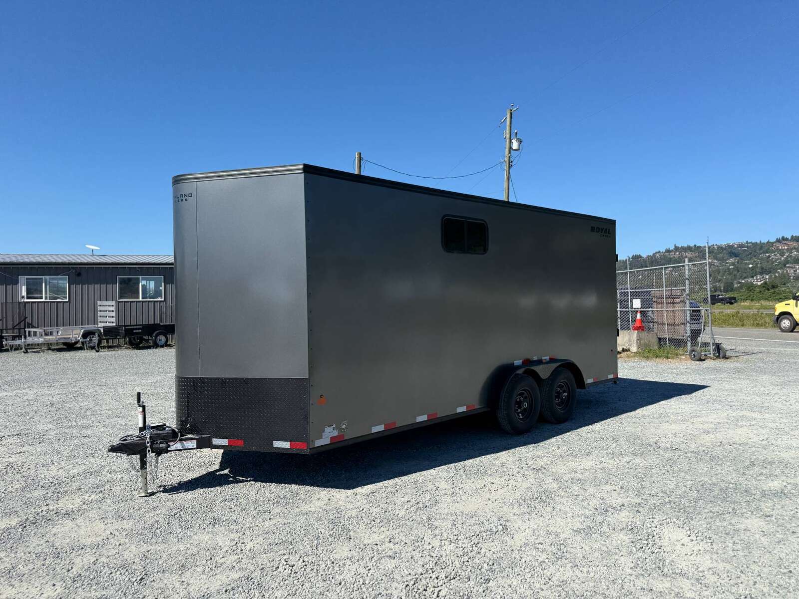 Photo of 2026 Royal 7.5x18 Cargo Enclosed Trailer Blackout Package w/ Side Windows Heavy Duty 11400lb GVW w/ Ramp Door Charcoal Grey