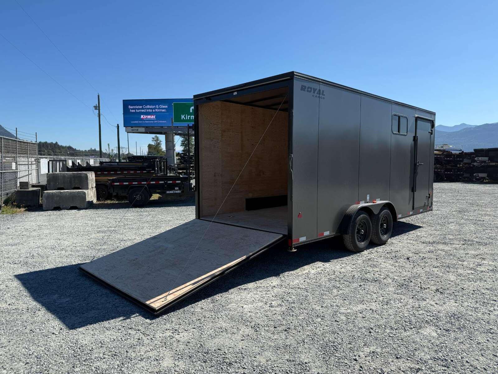 Photo of 2026 Royal 7.5x18 Cargo Enclosed Trailer Blackout Package w/ Side Windows Heavy Duty 11400lb GVW w/ Ramp Door Charcoal Grey