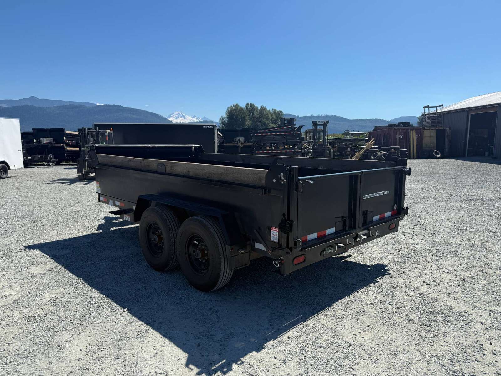 Photo of Used Pre Owned 2024 Southland Trailers 7x14 Dump Trailer HD 17,000lbs GVW w/ Hydraulic Front Jack