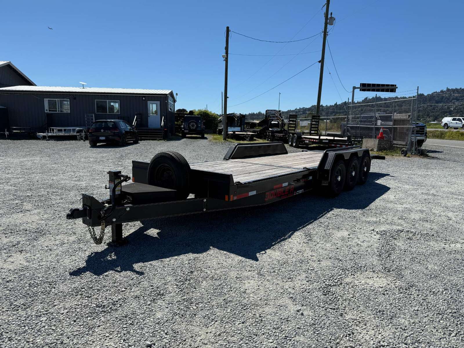 Photo of Pre Owned Used 2023 Double A 24ft Tilt Deck Equipment Trailer Triple Axle 21,000lb GVW
