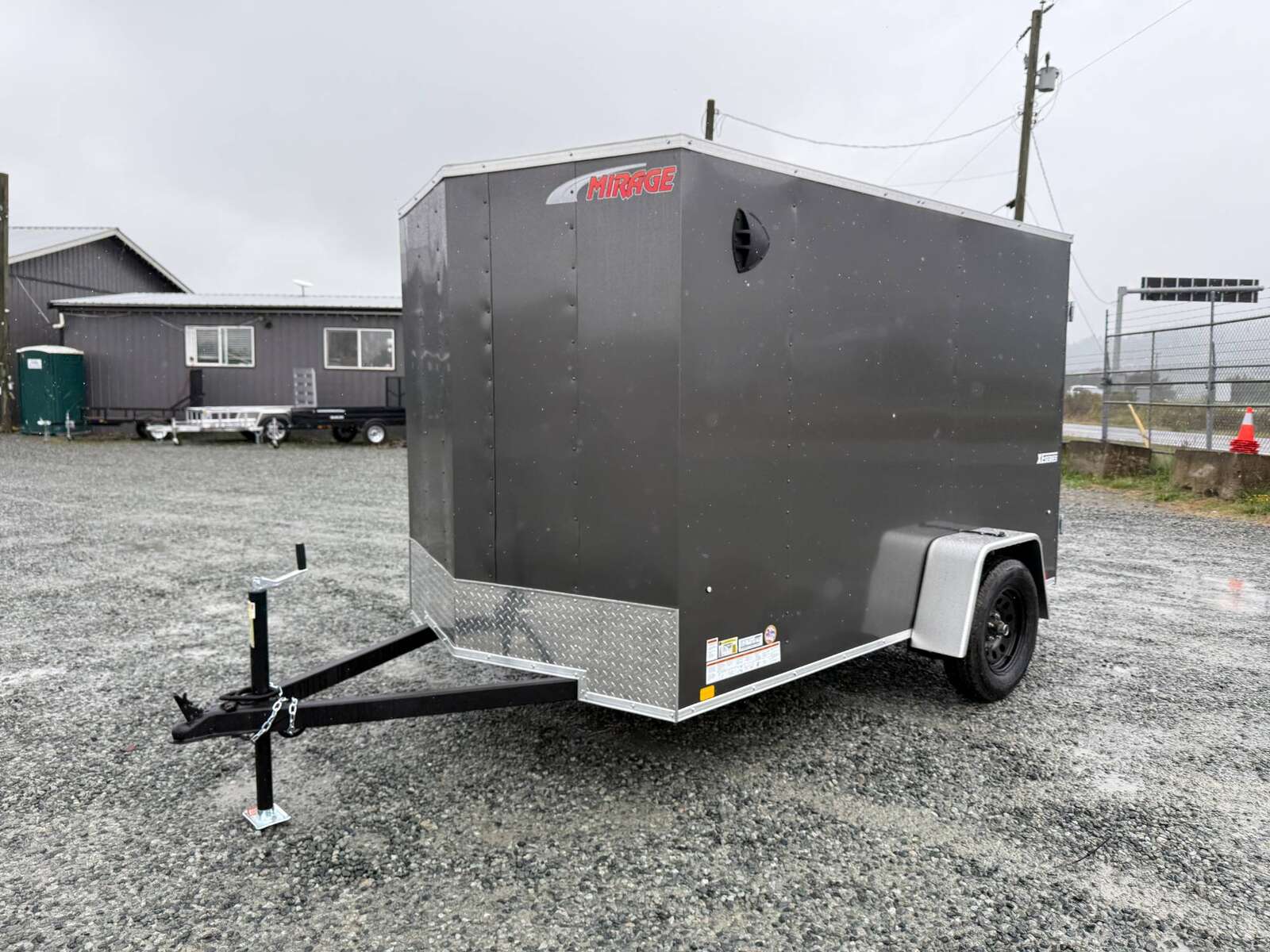 Photo of 2026 Mirage XE 6x10 Enclosed Cargo Trailer V Nose Barn Doors Charcoal Grey Standard Height 2990lb GVW