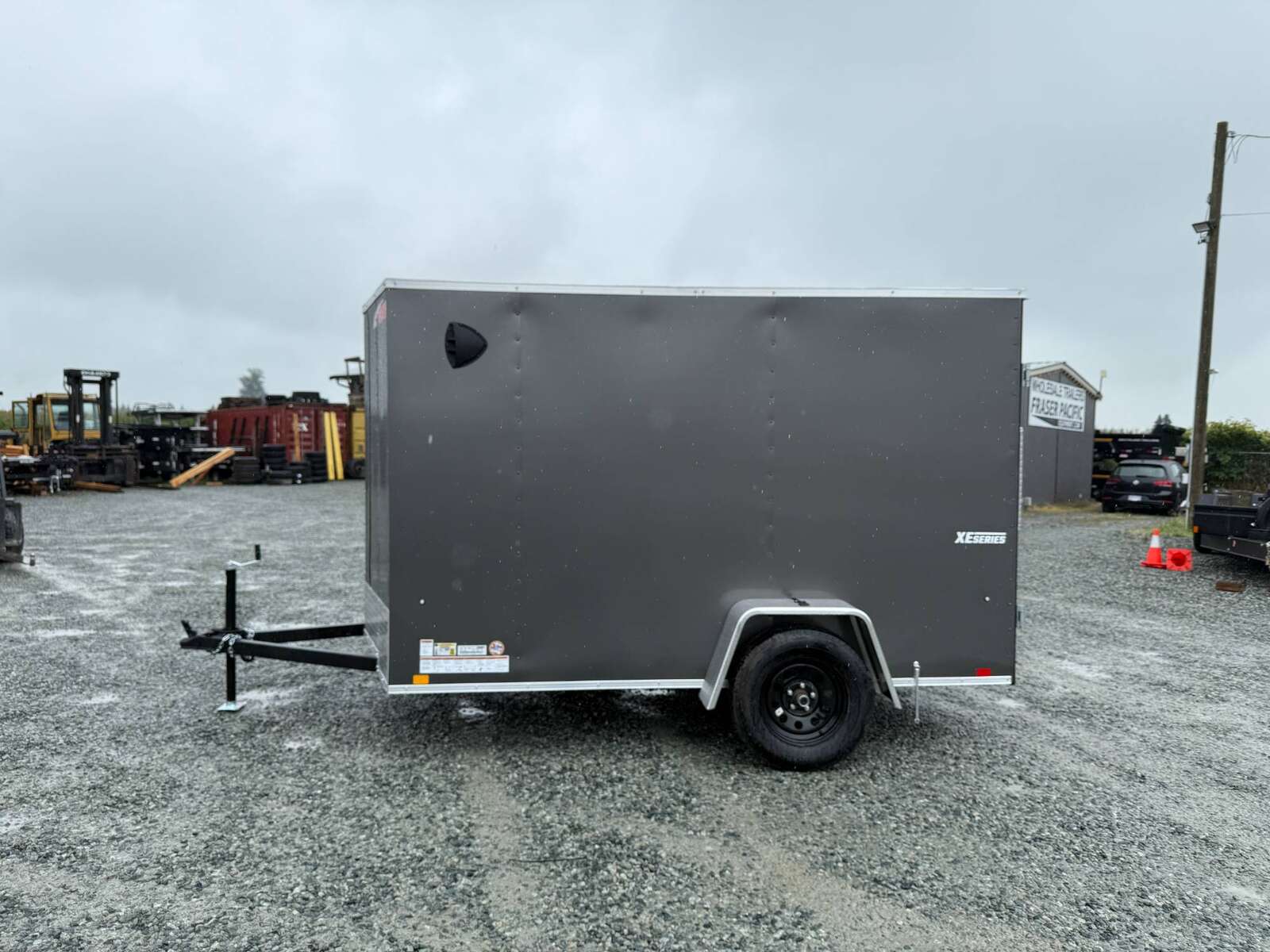 Photo of 2026 Mirage XE 6x10 Enclosed Cargo Trailer V Nose Barn Doors Charcoal Grey Standard Height 2990lb GVW