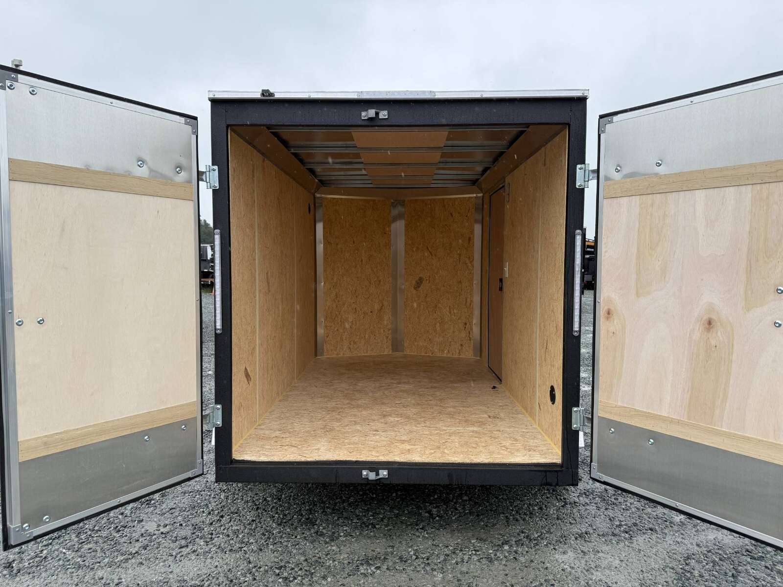 Photo of 2026 Mirage XE 6x10 Enclosed Cargo Trailer V Nose Barn Doors Charcoal Grey Standard Height 2990lb GVW