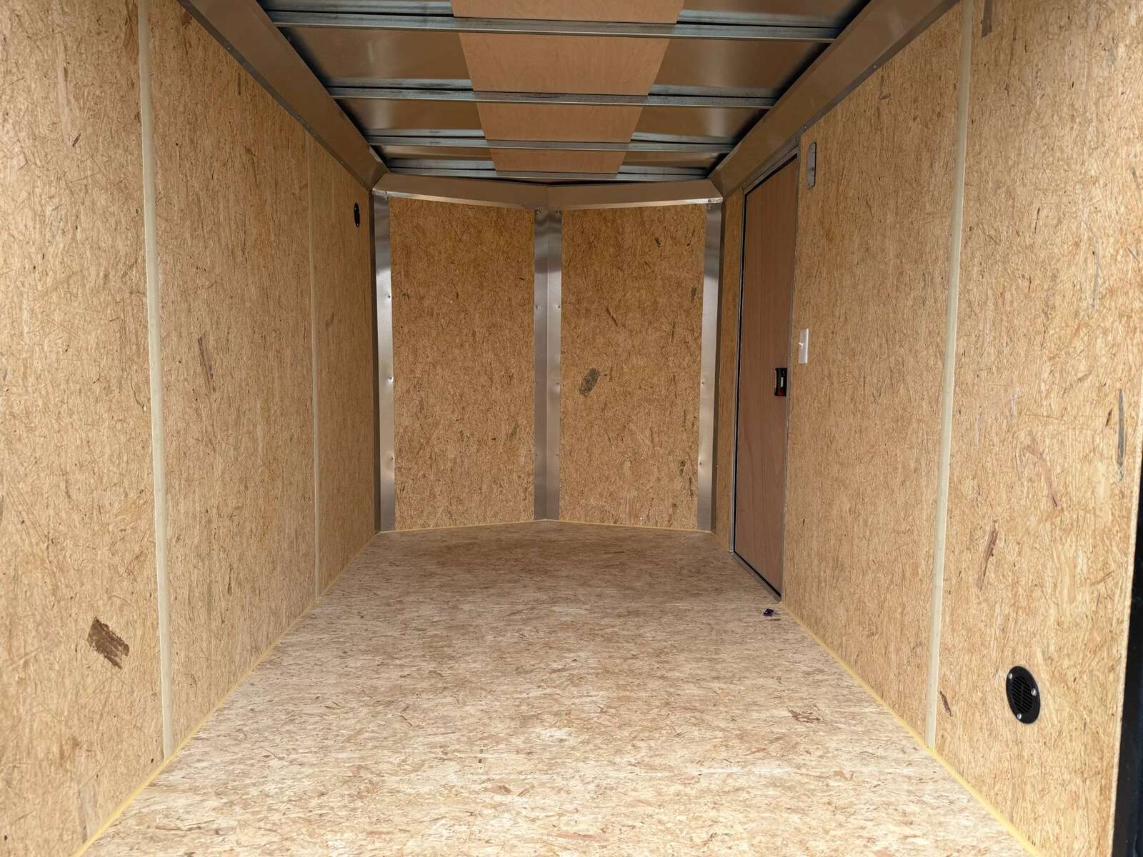 Photo of 2026 Mirage XE 6x10 Enclosed Cargo Trailer V Nose Barn Doors Charcoal Grey Standard Height 2990lb GVW
