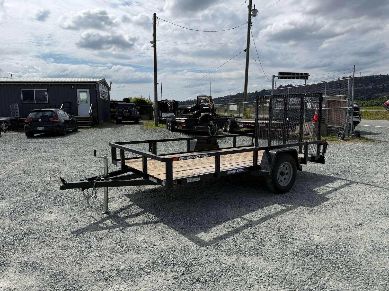 Photo of Used Pre Owned 2023 Suretrac 6x12 2990LB GVW Heavy Duty Utility Trailer w/ Ramp gate