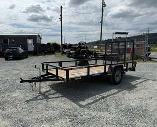 Thumbnail Photo of Used Pre Owned 2023 Suretrac 6x12 2990LB GVW Heavy Duty Utility Trailer w/ Ramp gate
