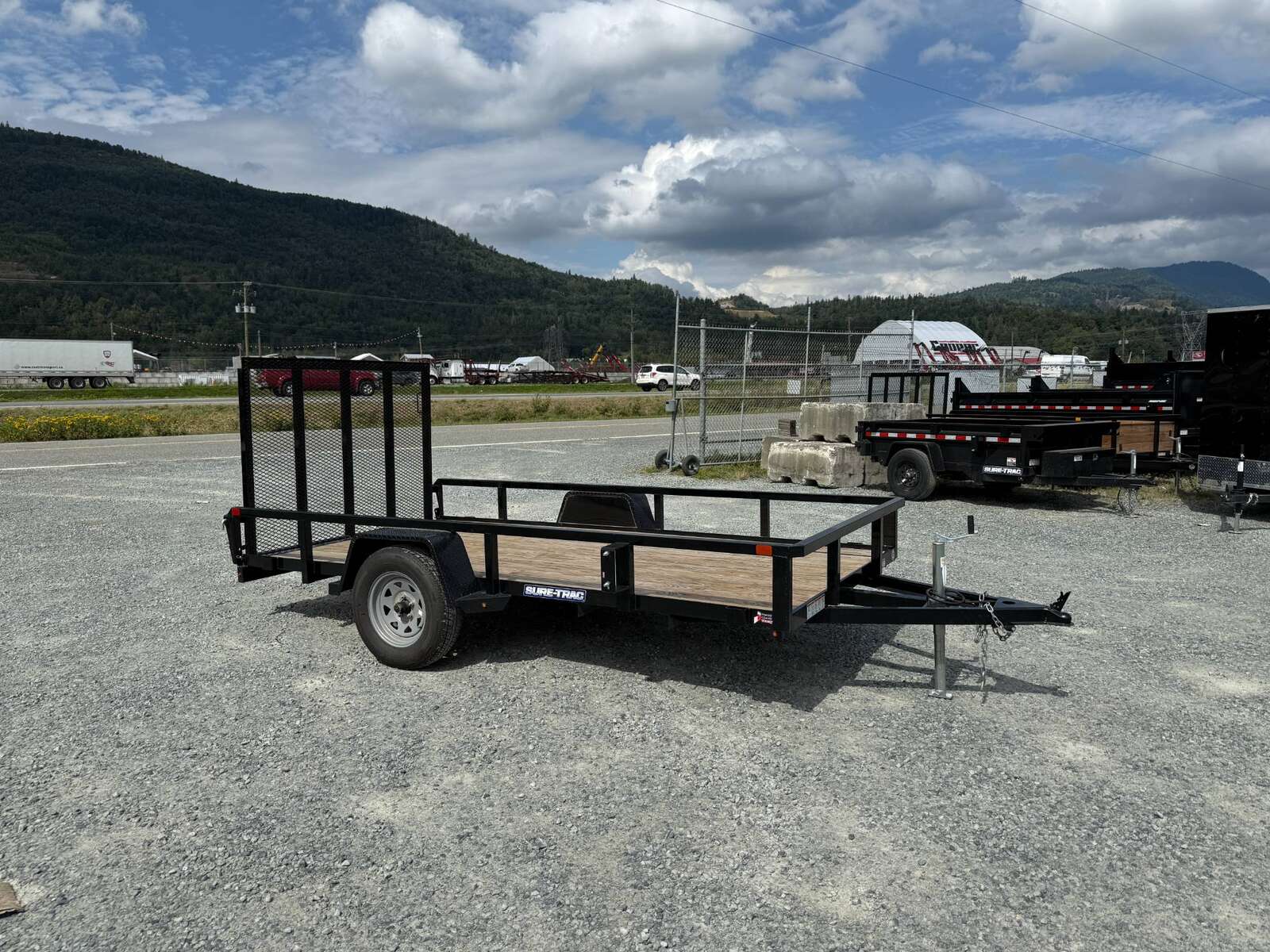 Photo of Used Pre Owned 2023 Suretrac 6x12 2990LB GVW Heavy Duty Utility Trailer w/ Ramp gate