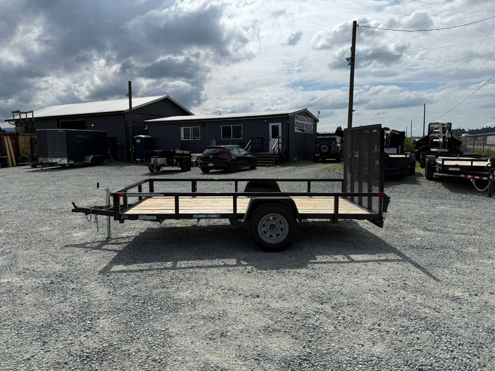 Photo of Used Pre Owned 2023 Suretrac 6x12 2990LB GVW Heavy Duty Utility Trailer w/ Ramp gate