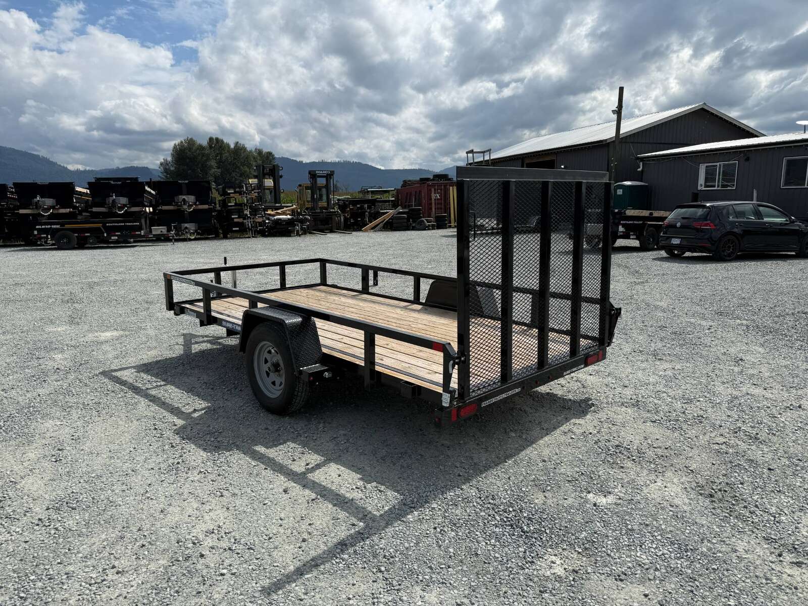 Photo of Used Pre Owned 2023 Suretrac 6x12 2990LB GVW Heavy Duty Utility Trailer w/ Ramp gate