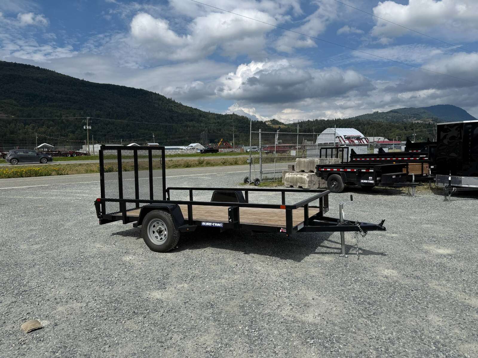 Photo of Used Pre Owned 2023 Suretrac 6x12 2990LB GVW Heavy Duty Utility Trailer w/ Ramp gate