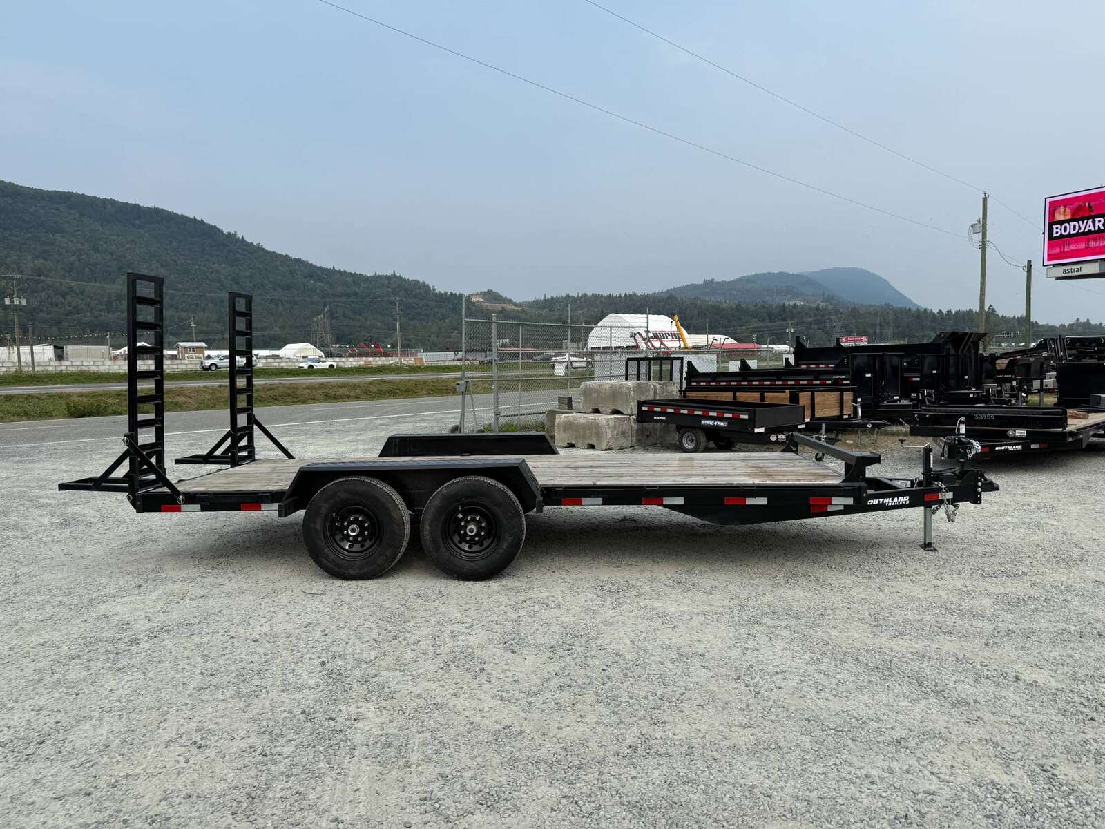 Photo of Used Pre Owned 2024 Southland 7X18 15,400LB GVW Equipment Flat Deck Trailer w/ Stand Up Ramps