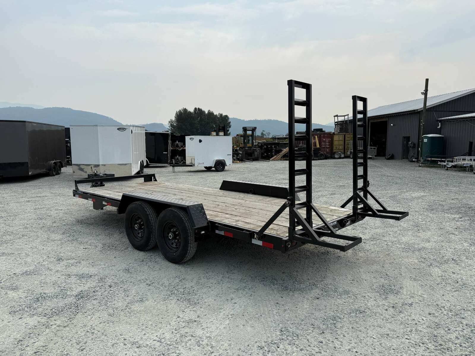 Photo of Used Pre Owned 2024 Southland 7X18 15,400LB GVW Equipment Flat Deck Trailer w/ Stand Up Ramps